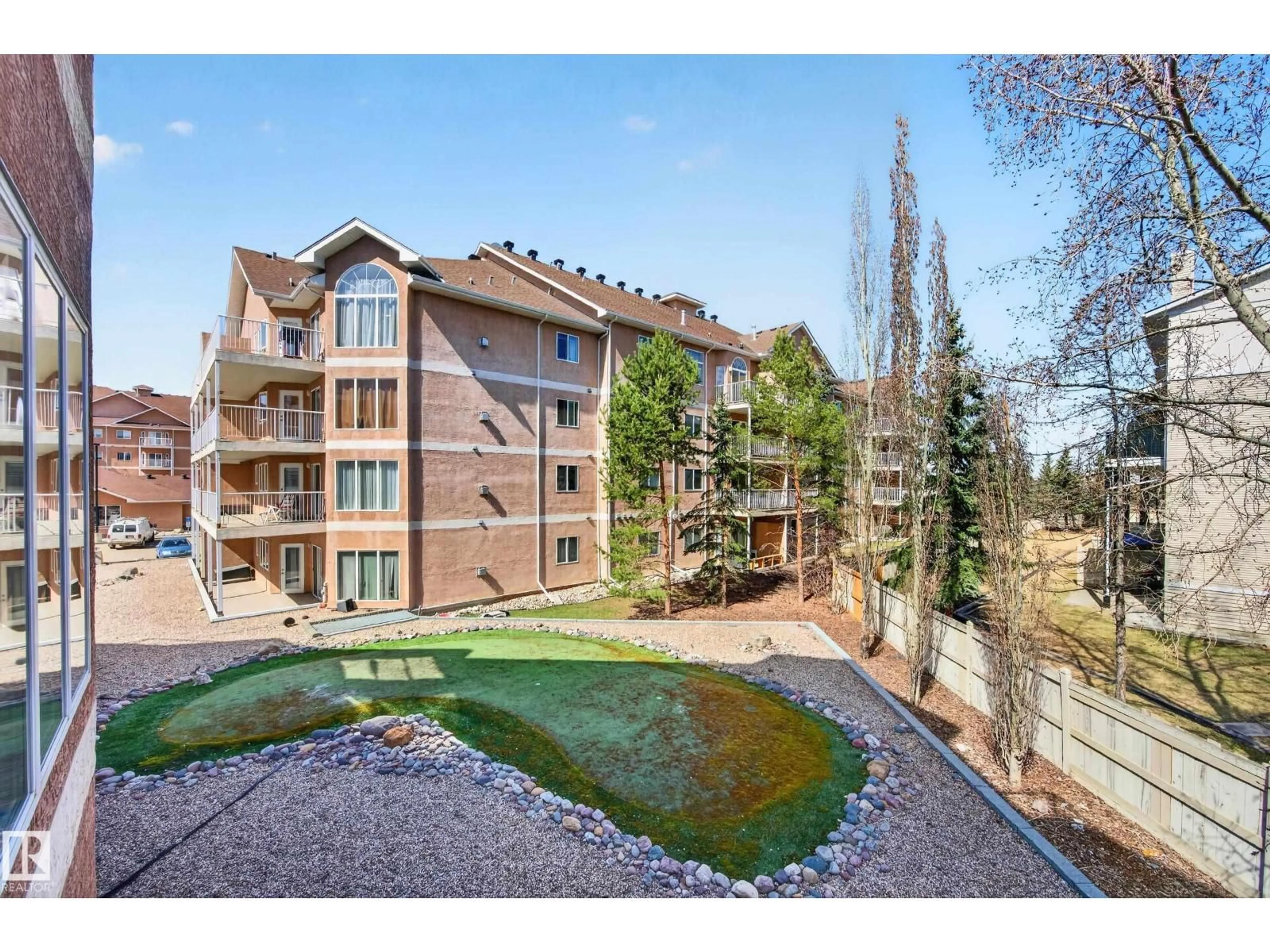 A pic from outside/outdoor area/front of a property/back of a property/a pic from drone, unknown for 222 - 4304 139 AV, Edmonton Alberta T5Y0H6