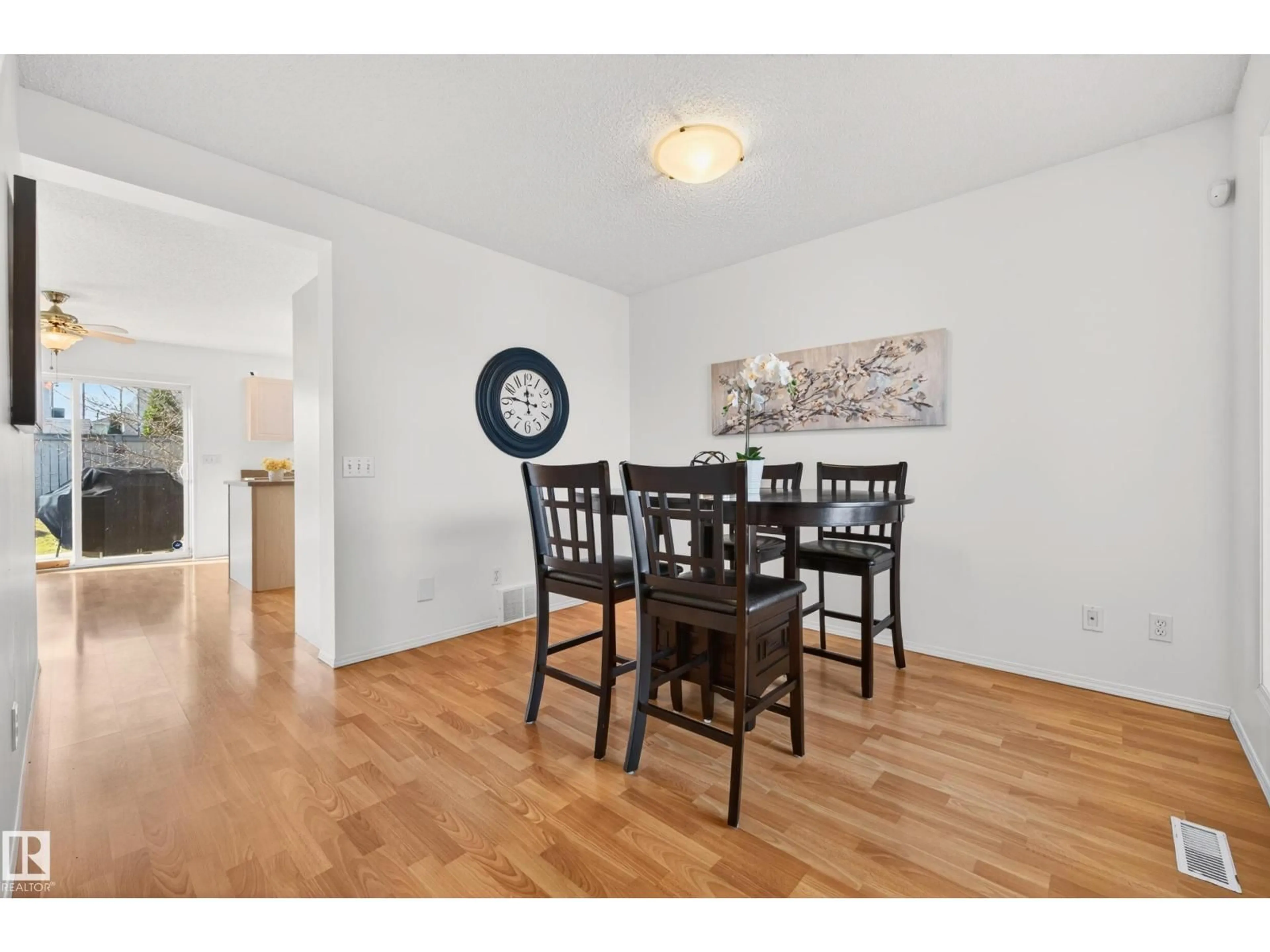 Dining room, wood/laminate floor for 19019 49 AV, Edmonton Alberta T6M2T9