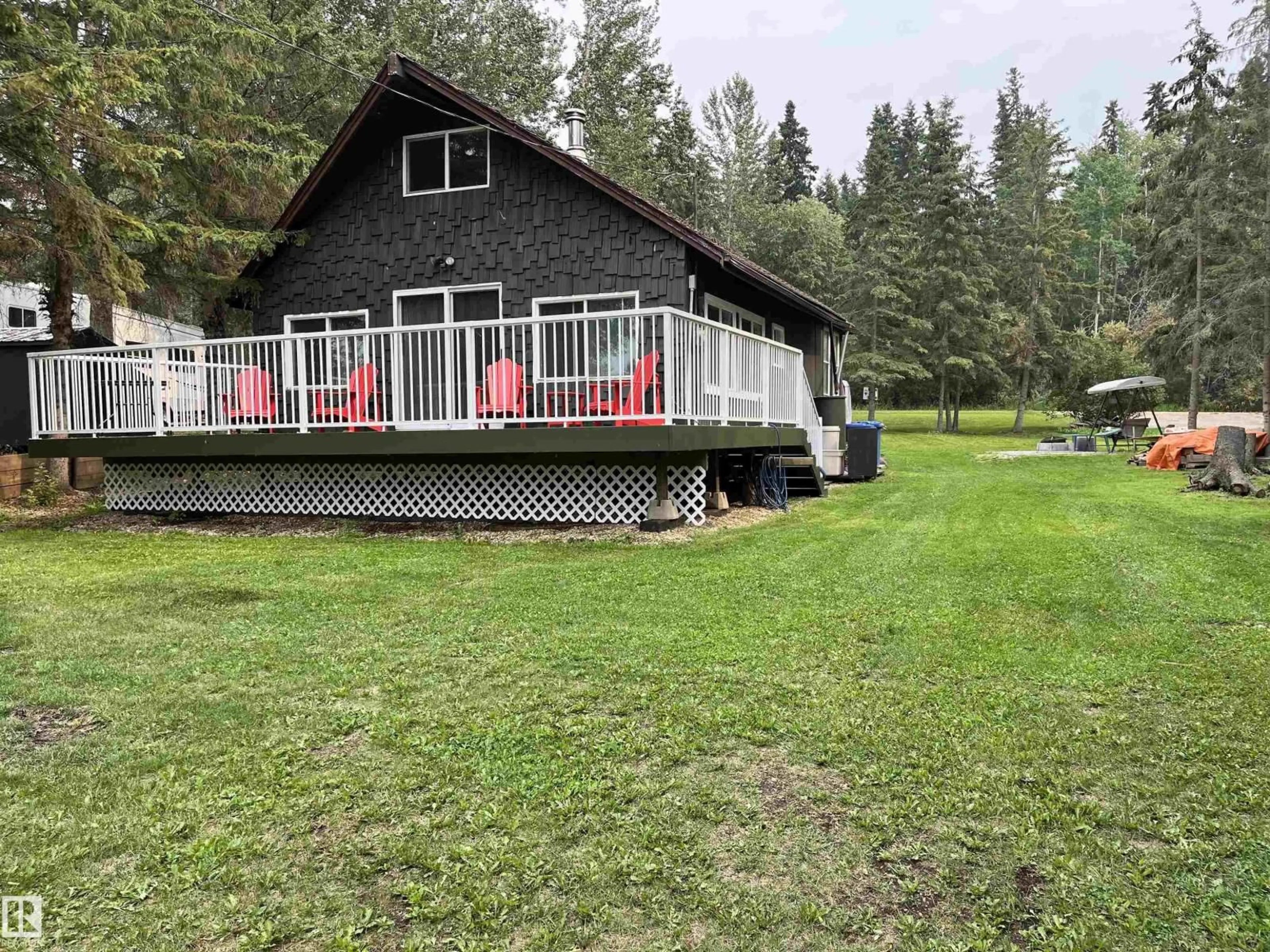 A pic from outside/outdoor area/front of a property/back of a property/a pic from drone, water/lake/river/ocean view for 41 - 5414 TWP RD 535, Rural Parkland County Alberta T0E0V0