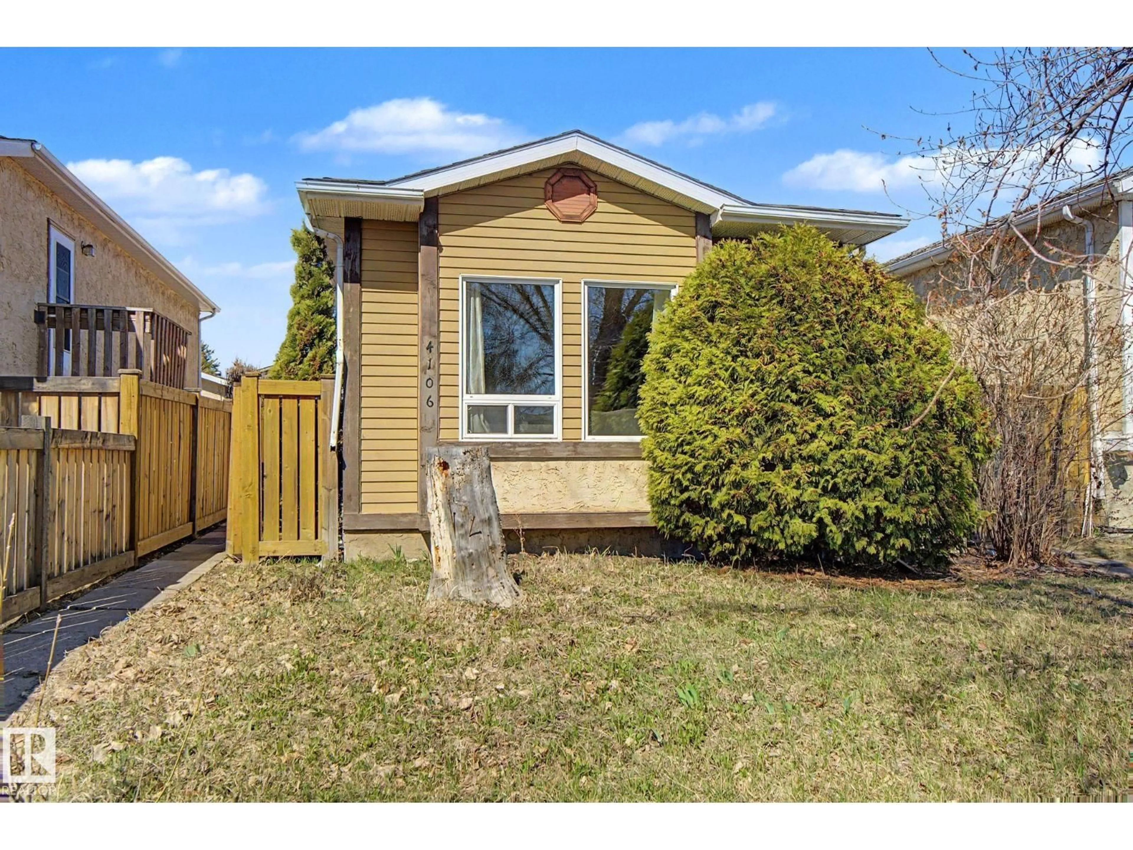 Home with vinyl exterior material, street for 4106 38 ST, Edmonton Alberta T6L5E4