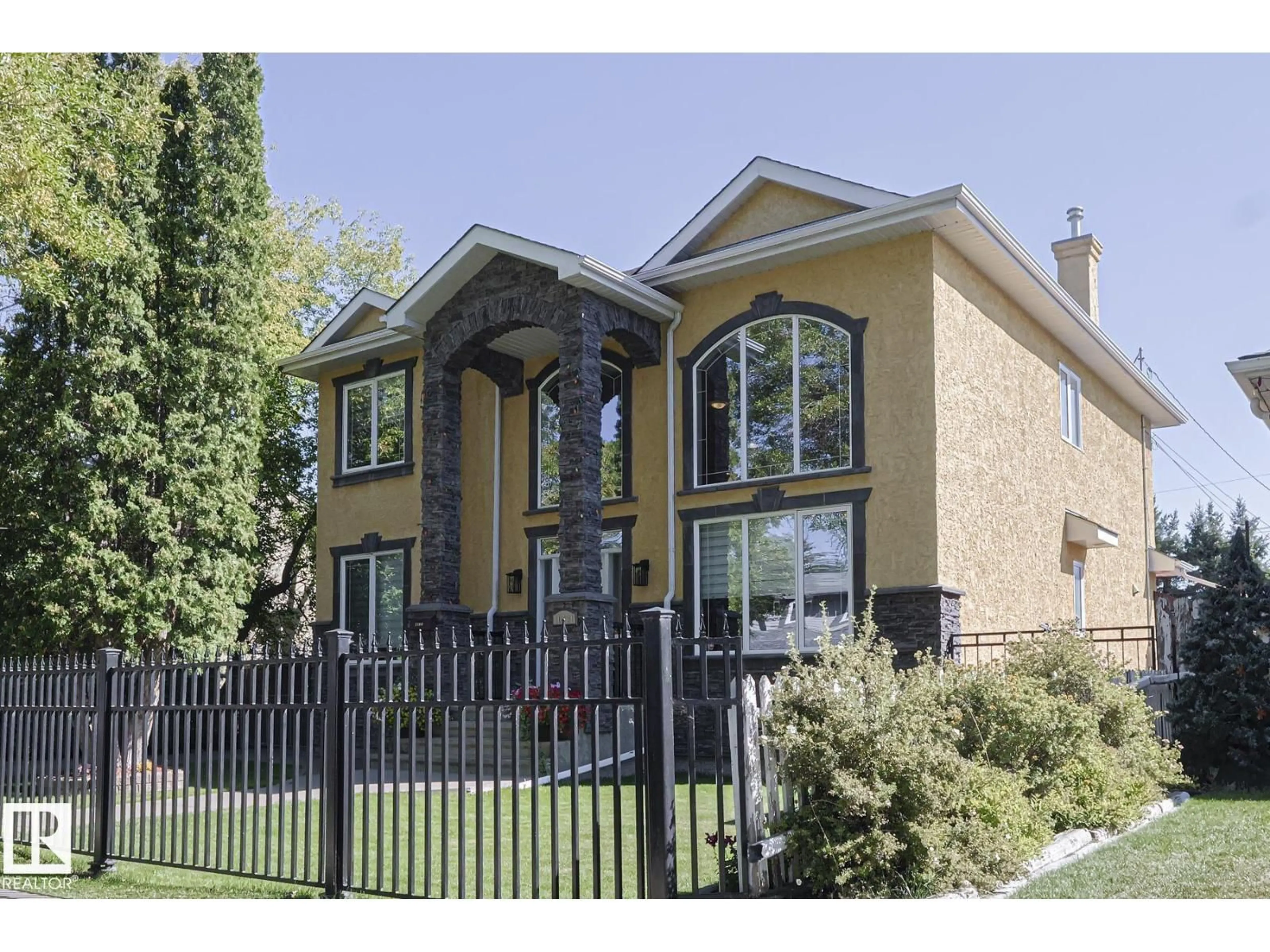 Home with brick exterior material, street for NW - 10731 150 ST, Edmonton Alberta T5P1R4