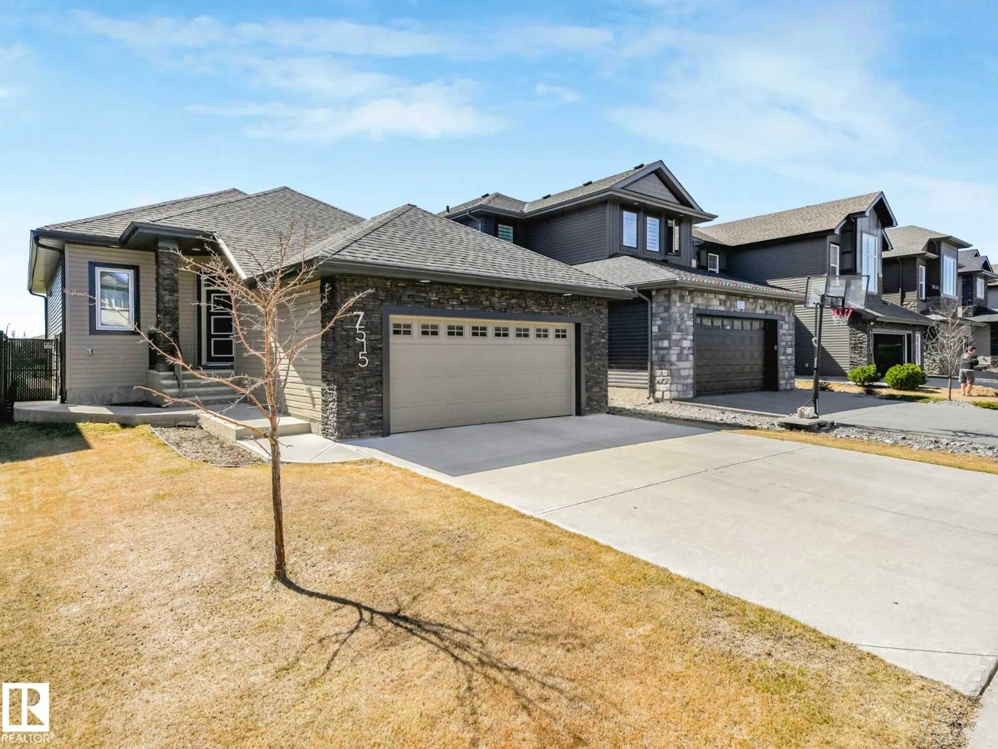 Home with brick exterior material, street for NW - 7515 173 AV, Edmonton Alberta T5Z0J6