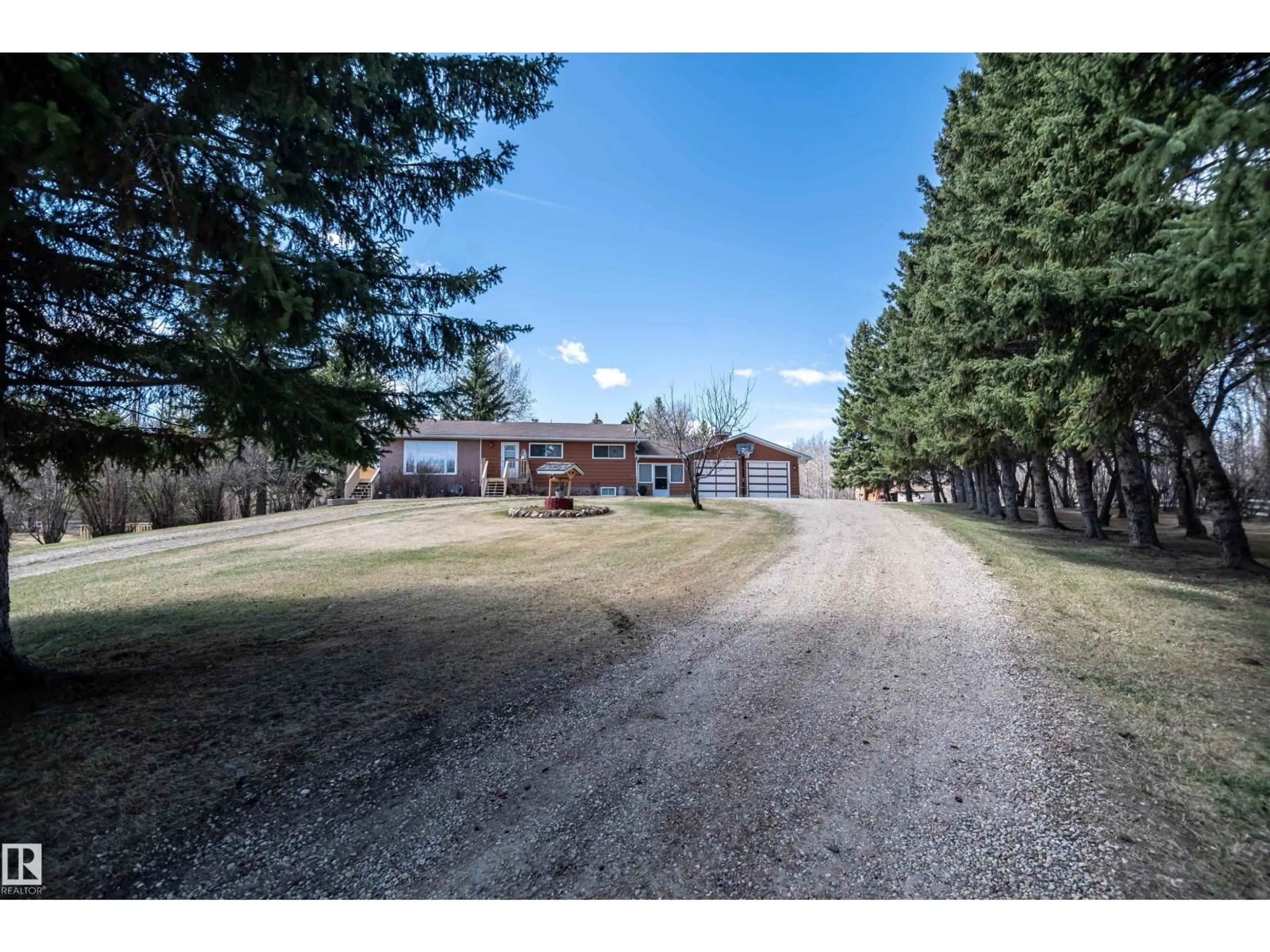 A pic from outside/outdoor area/front of a property/back of a property/a pic from drone, street for #8 - 54126 RGE ROAD 30, Rural Lac Ste. Anne County Alberta T0E1V0