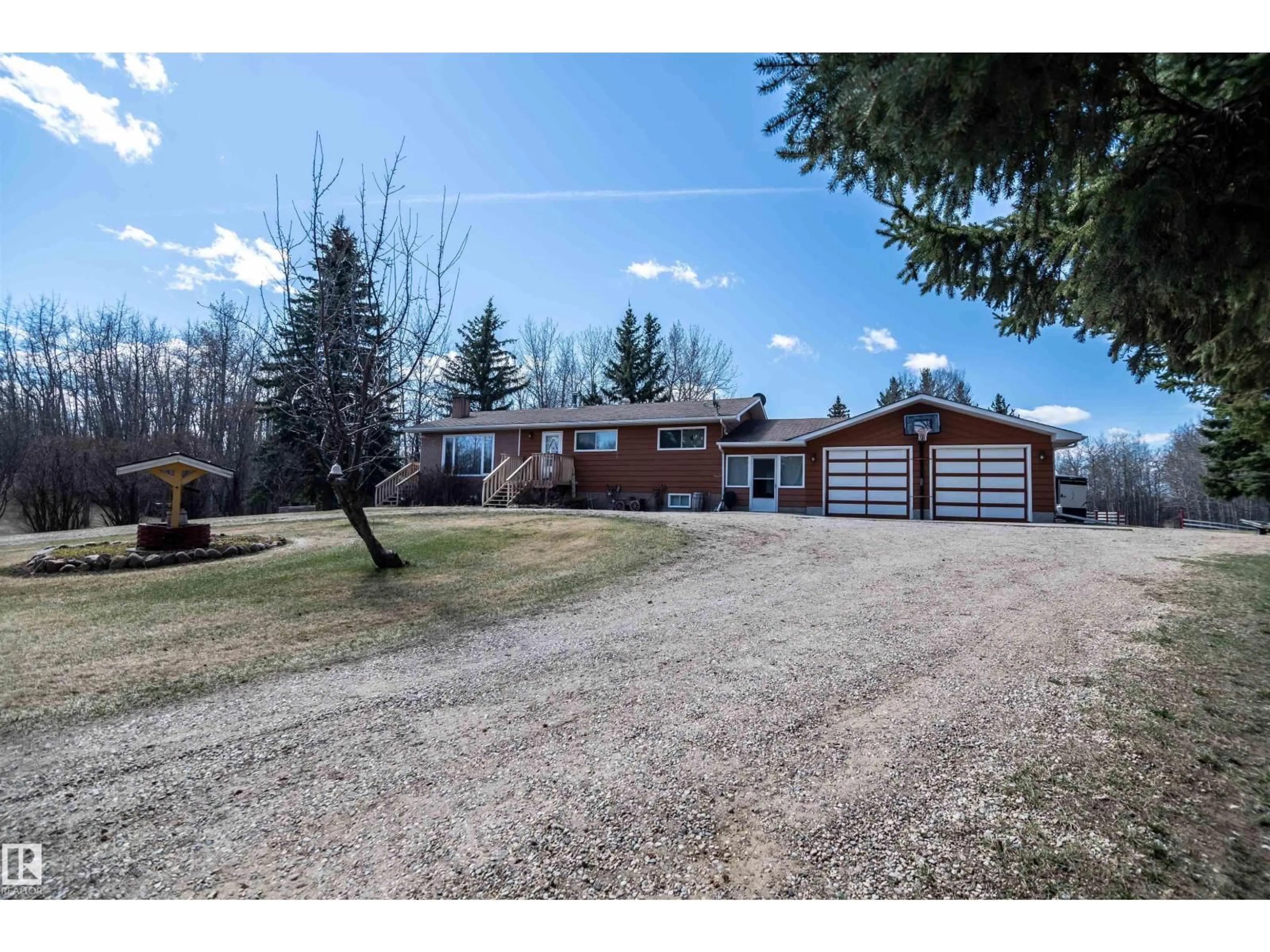 A pic from outside/outdoor area/front of a property/back of a property/a pic from drone, street for #8 - 54126 RGE ROAD 30, Rural Lac Ste. Anne County Alberta T0E1V0