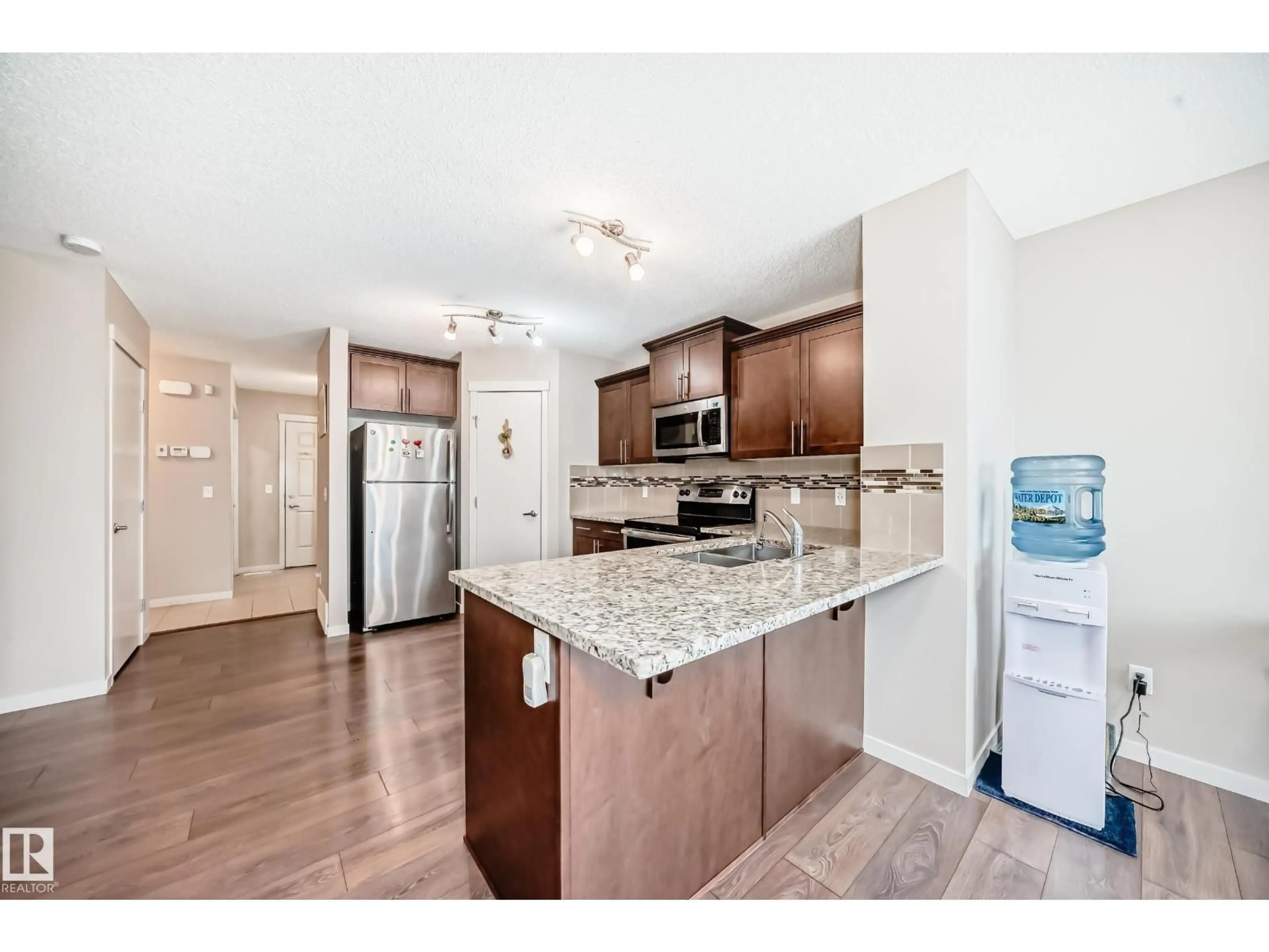 Open concept kitchen, unknown for NW - 17304 73 ST, Edmonton Alberta T5Z0L3