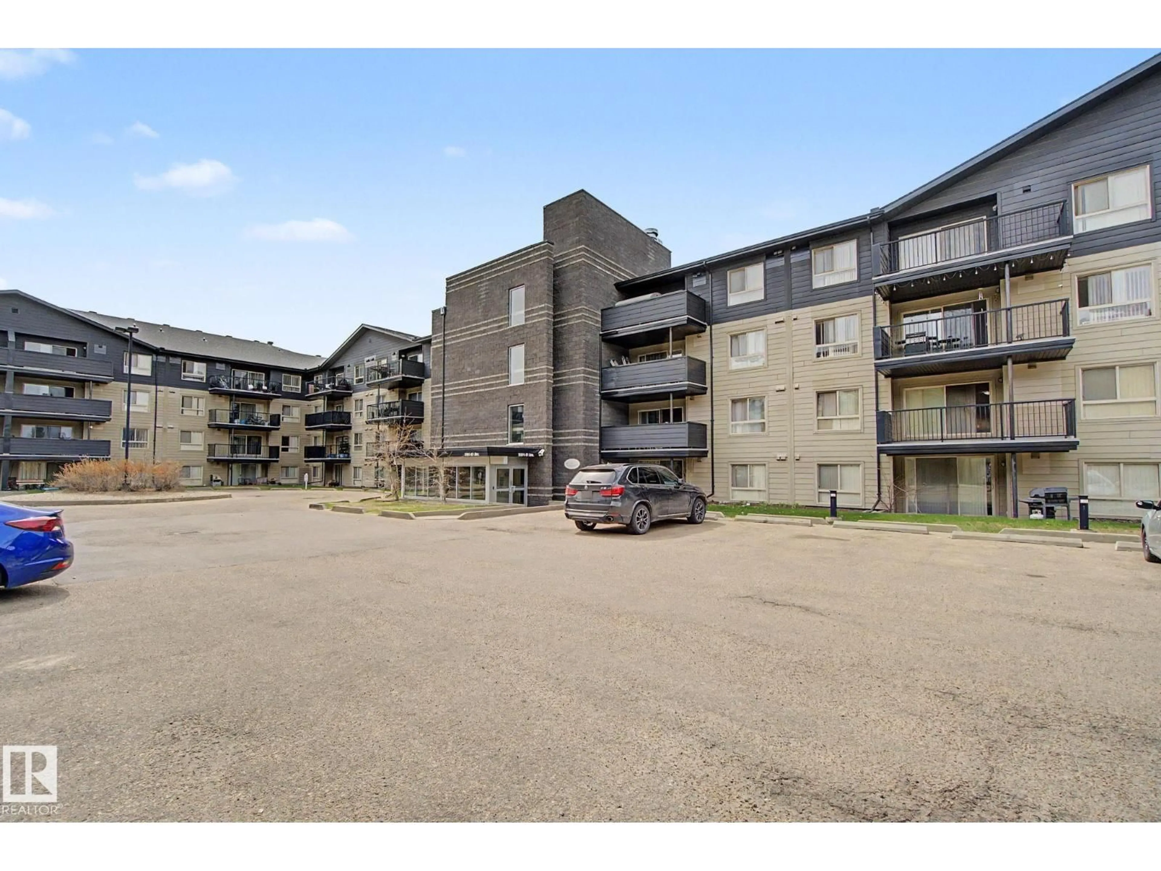 A pic from outside/outdoor area/front of a property/back of a property/a pic from drone, unknown for 214 - 17011 67 AV NW, Edmonton Alberta T5T6Y6