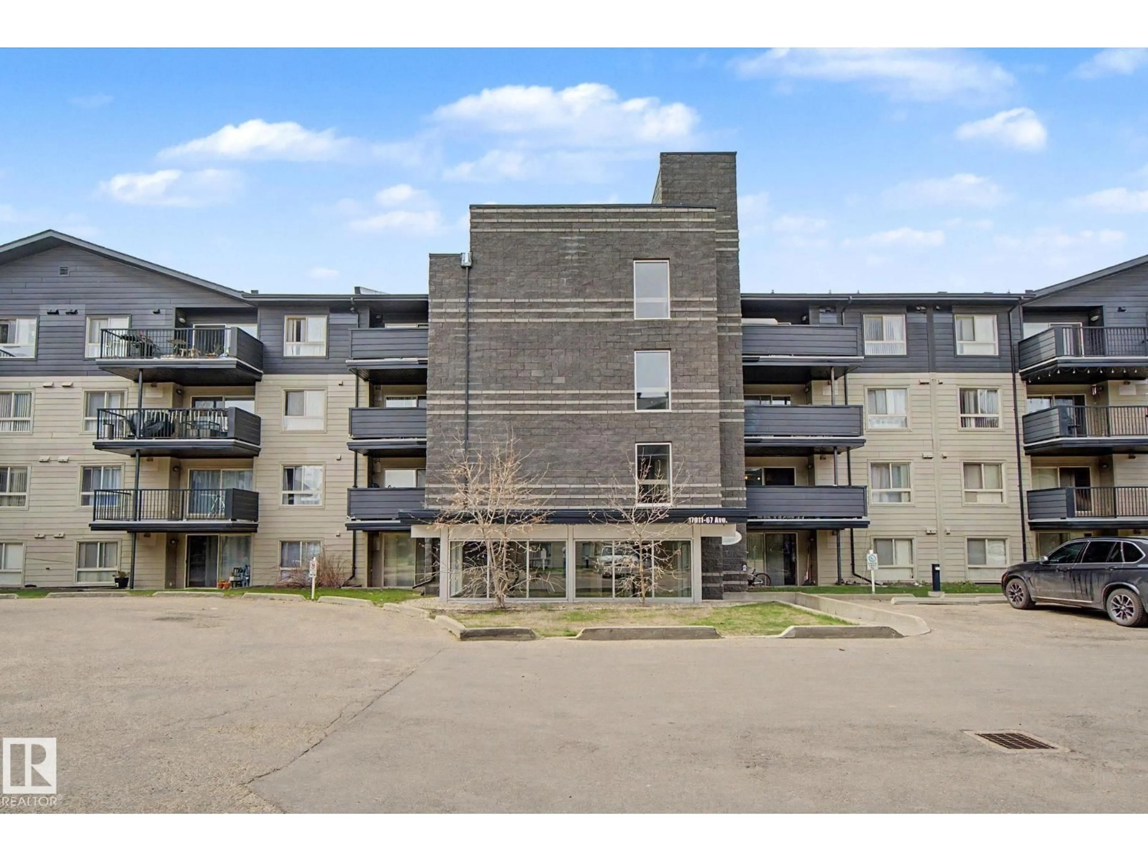 A pic from outside/outdoor area/front of a property/back of a property/a pic from drone, building for 214 - 17011 67 AV NW, Edmonton Alberta T5T6Y6