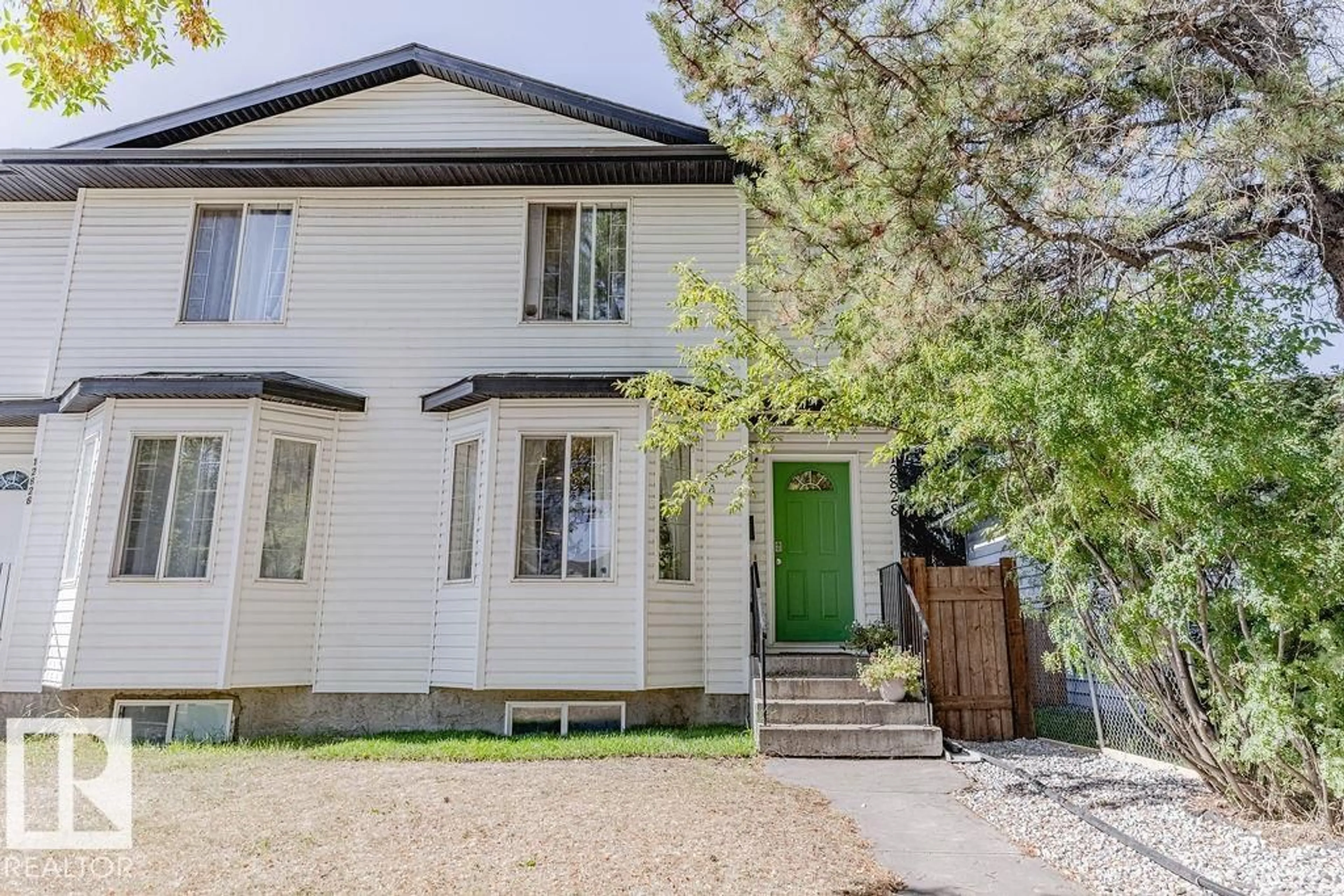 Home with brick exterior material, street for 12828 126 ST, Edmonton Alberta T5L0Y1
