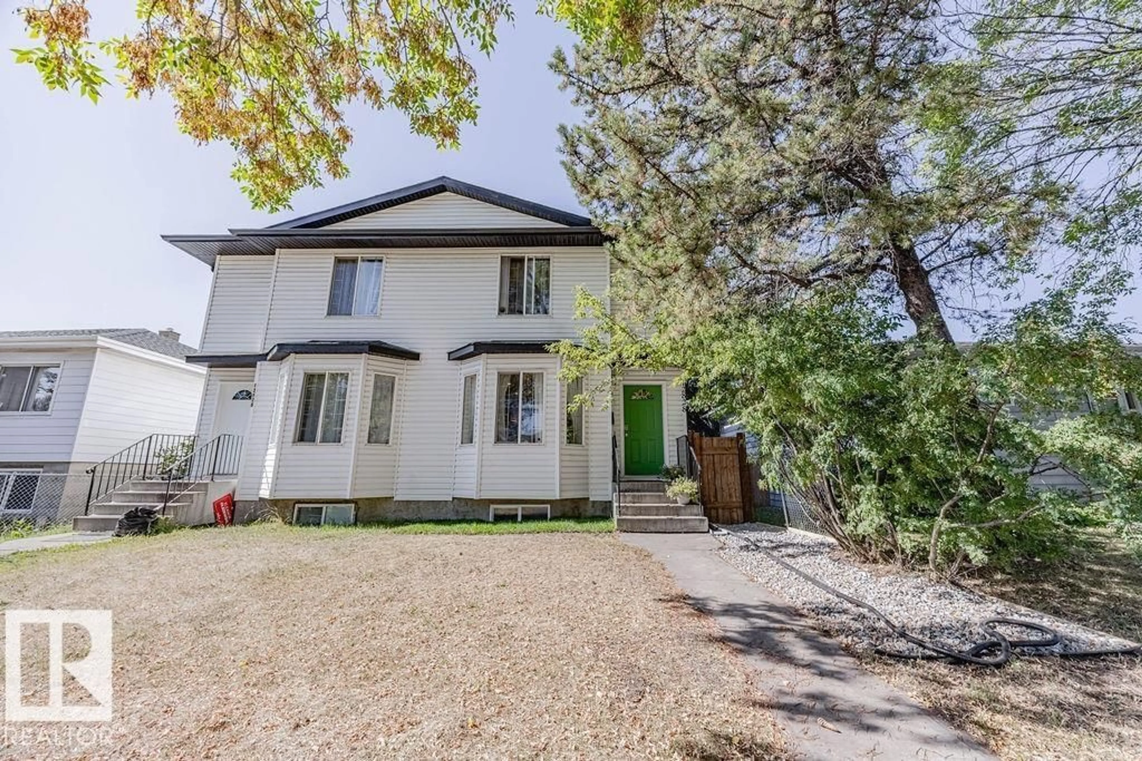 A pic from outside/outdoor area/front of a property/back of a property/a pic from drone, street for 12828 126 ST, Edmonton Alberta T5L0Y1