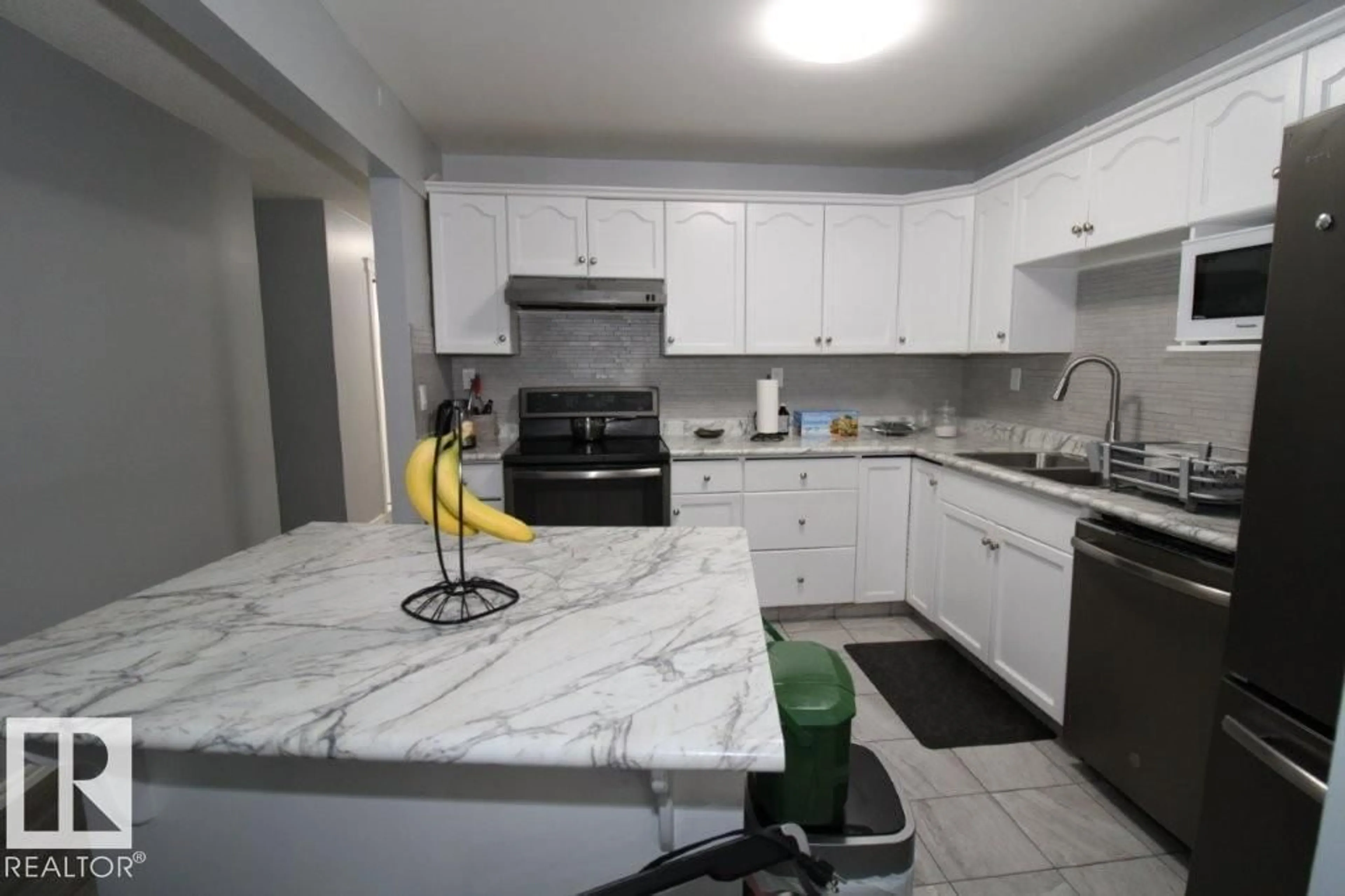 Standard kitchen, ceramic/tile floor for #104 - 1620 48 ST, Edmonton Alberta T6L5P1