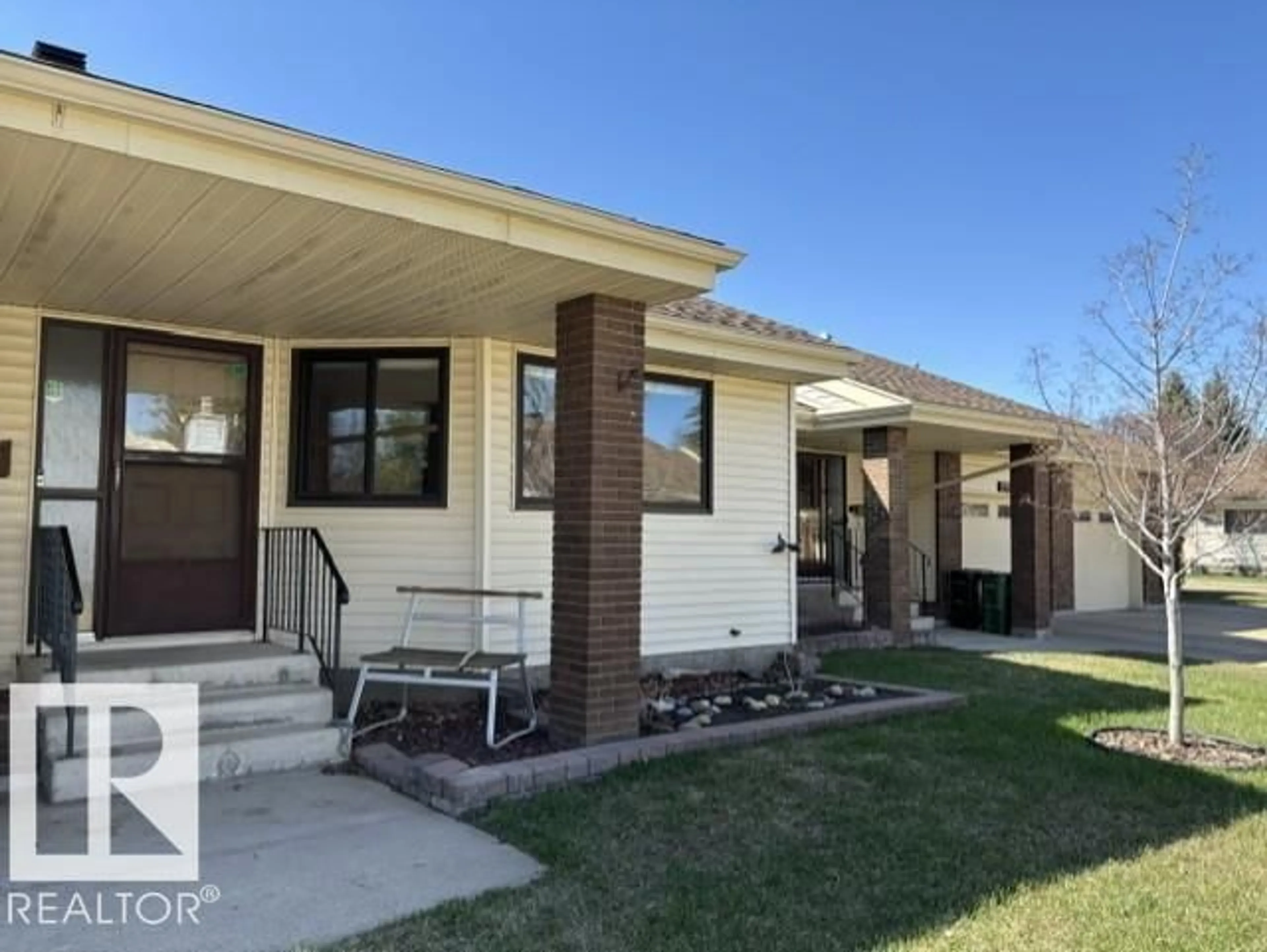 Home with vinyl exterior material, street for 241 OEMING RD, Edmonton Alberta T6R1M1