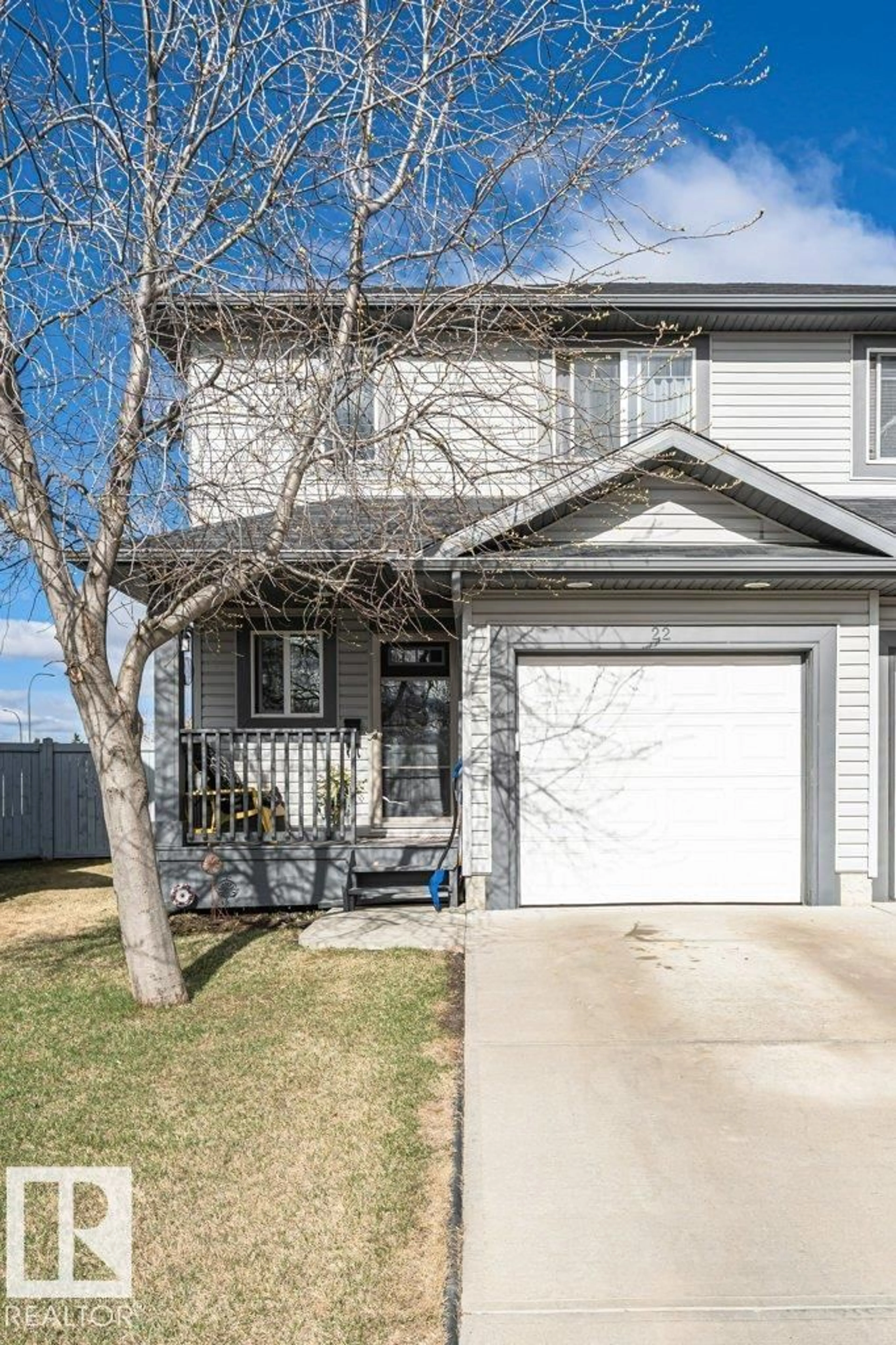 Home with vinyl exterior material, street for 22 REED, Fort Saskatchewan Alberta T8L0E8