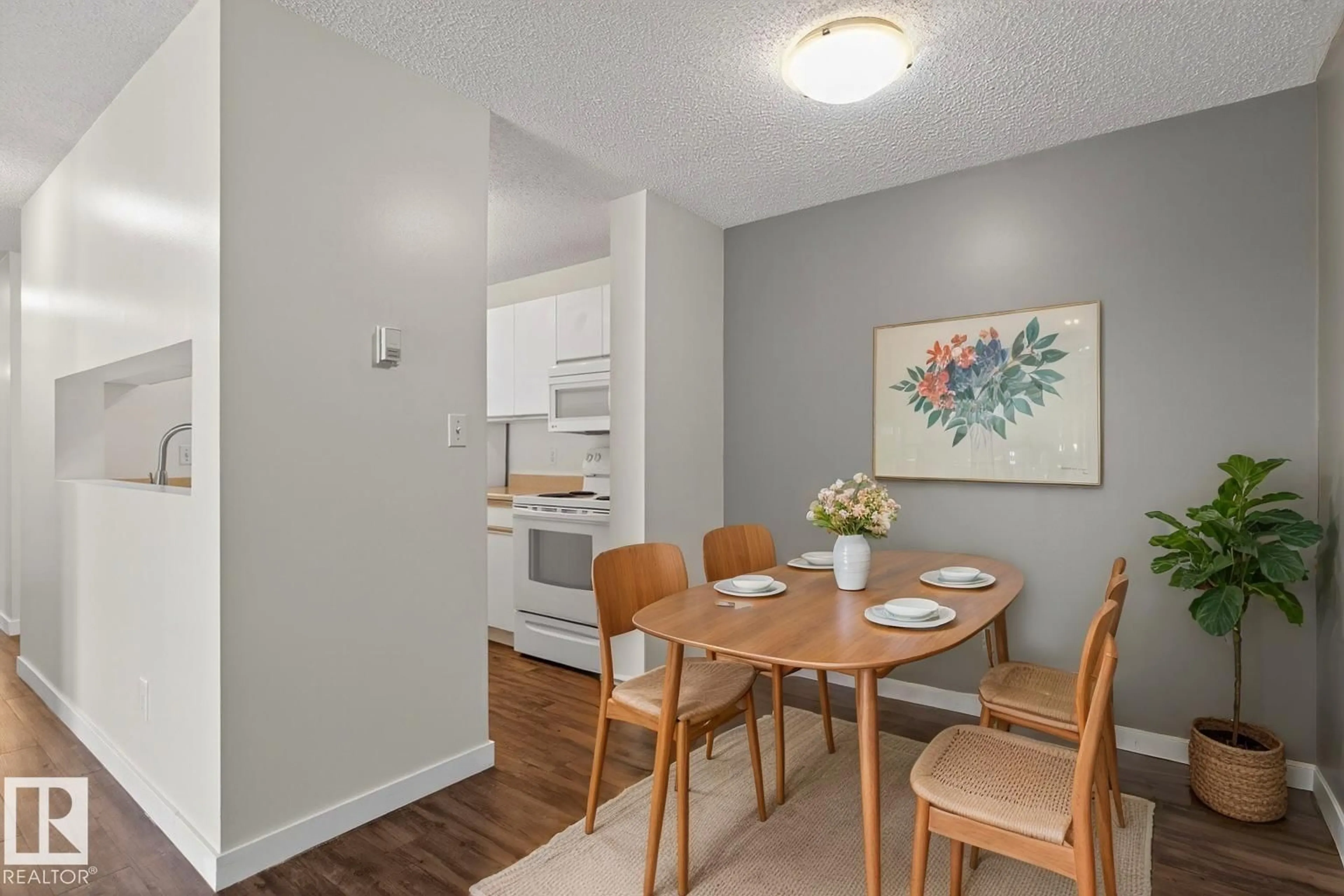 Dining room, wood/laminate floor for 430 2520 50 ST NW, Edmonton Alberta T6L7A8