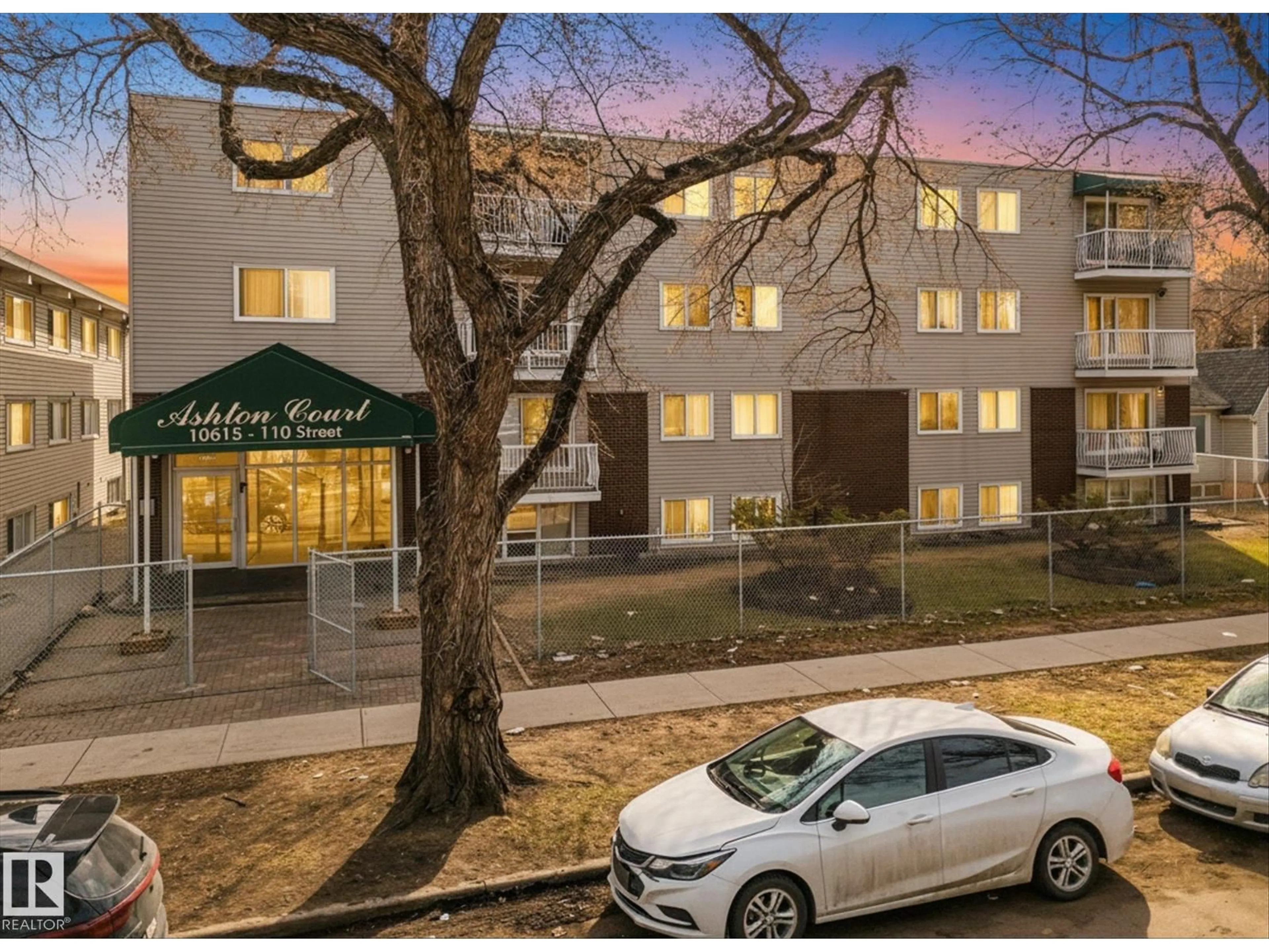 A pic from outside/outdoor area/front of a property/back of a property/a pic from drone, street for 102 10615 110 ST NW, Edmonton Alberta T5H3C7