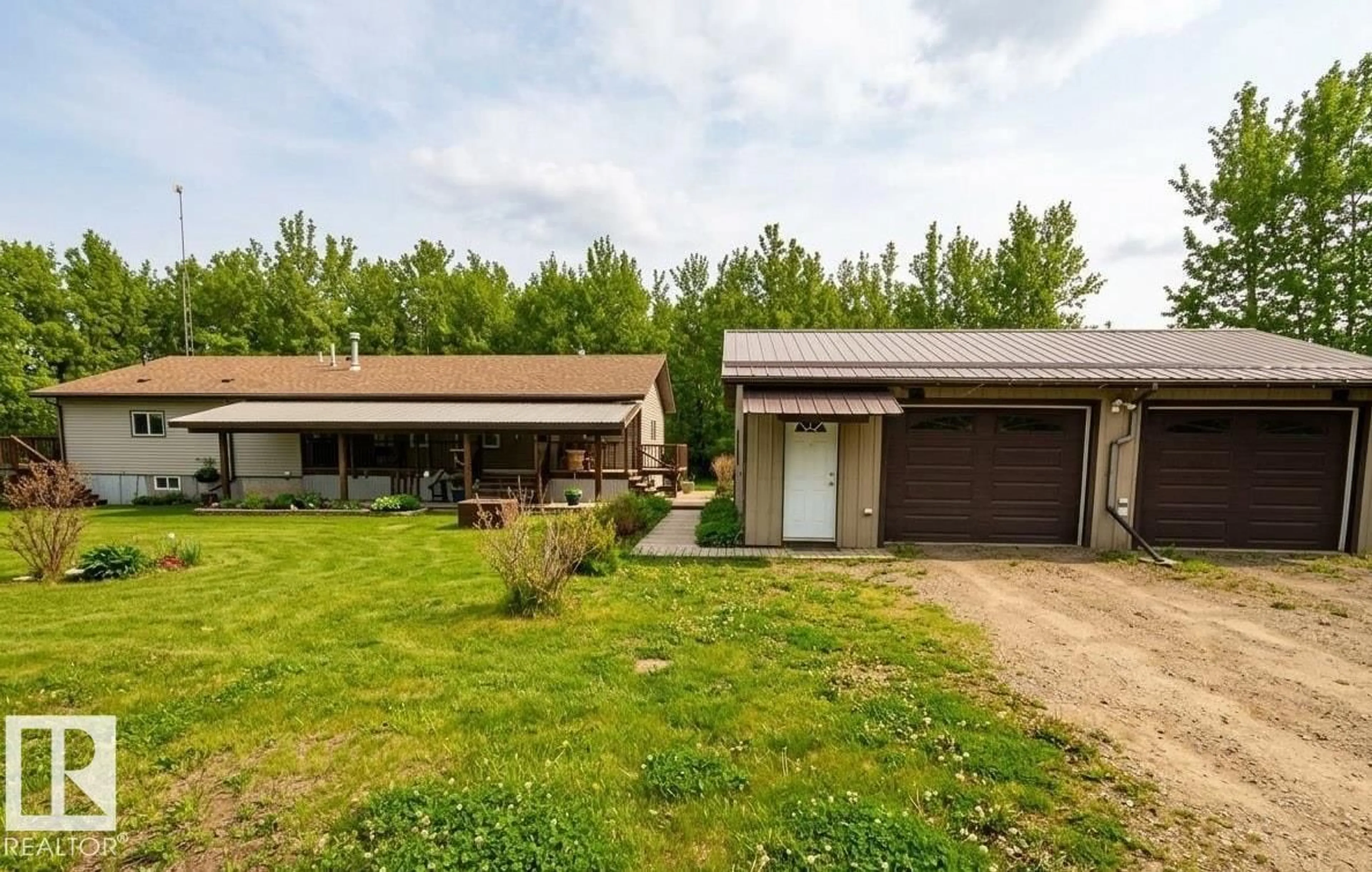 A pic from outside/outdoor area/front of a property/back of a property/a pic from drone, building for 47424 RGE ROAD 20 A, Rural Leduc County Alberta T0C2P0