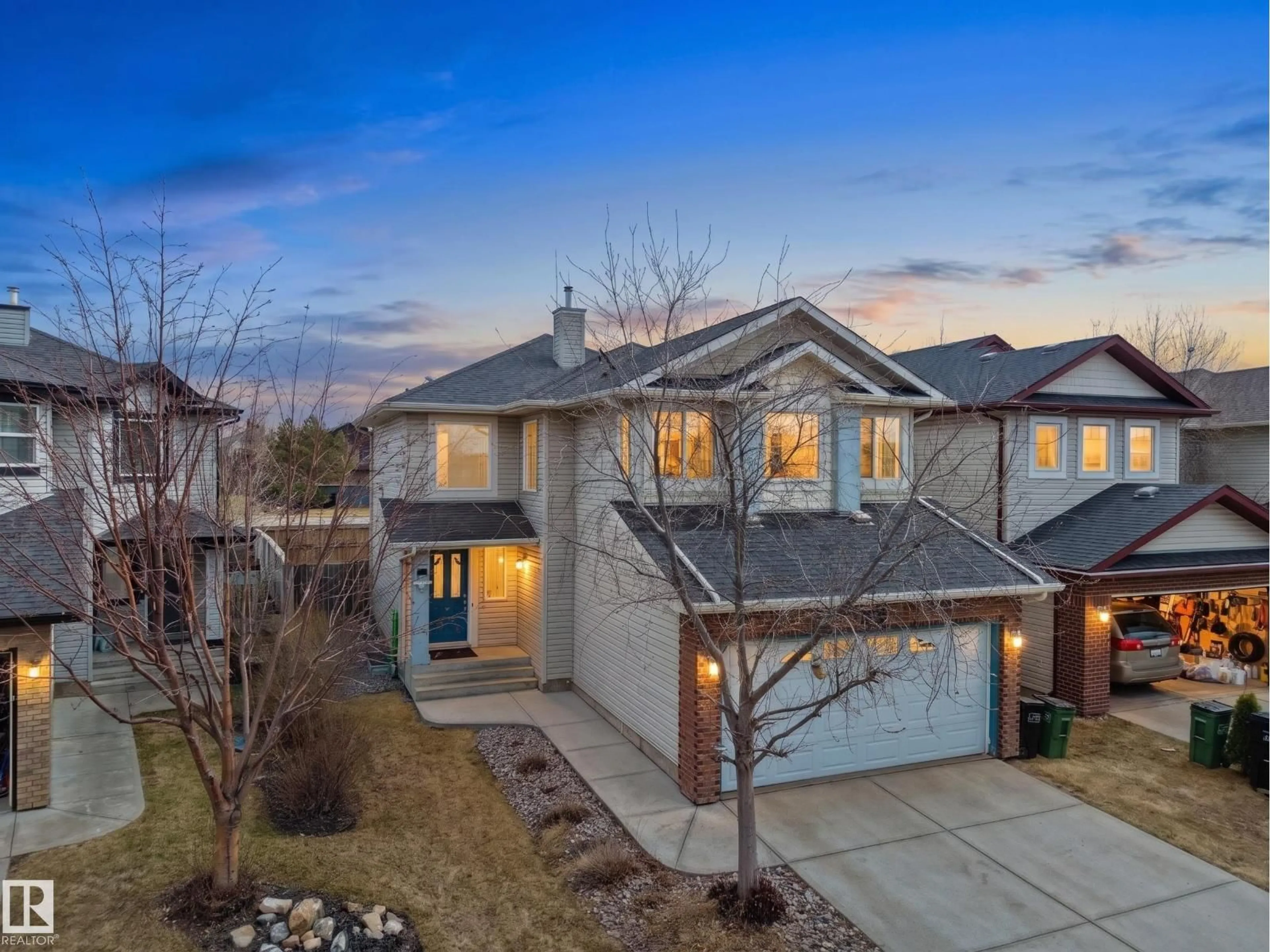 A pic from outside/outdoor area/front of a property/back of a property/a pic from drone, street for NW - 7407 SINGER LANDING LD, Edmonton Alberta T6R3S2