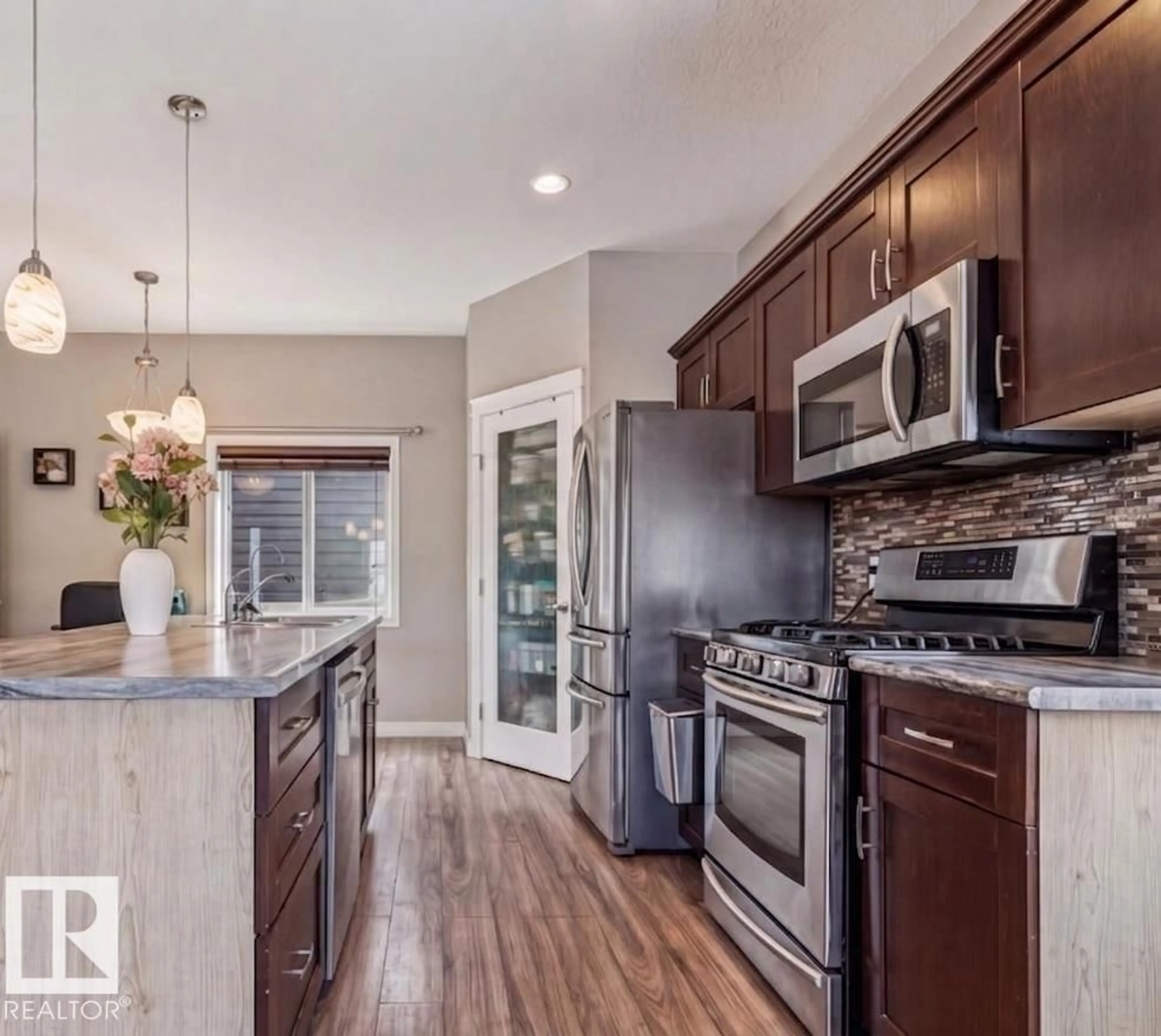 Open concept kitchen, unknown for 12513 120 AV, Edmonton Alberta T5L2P8