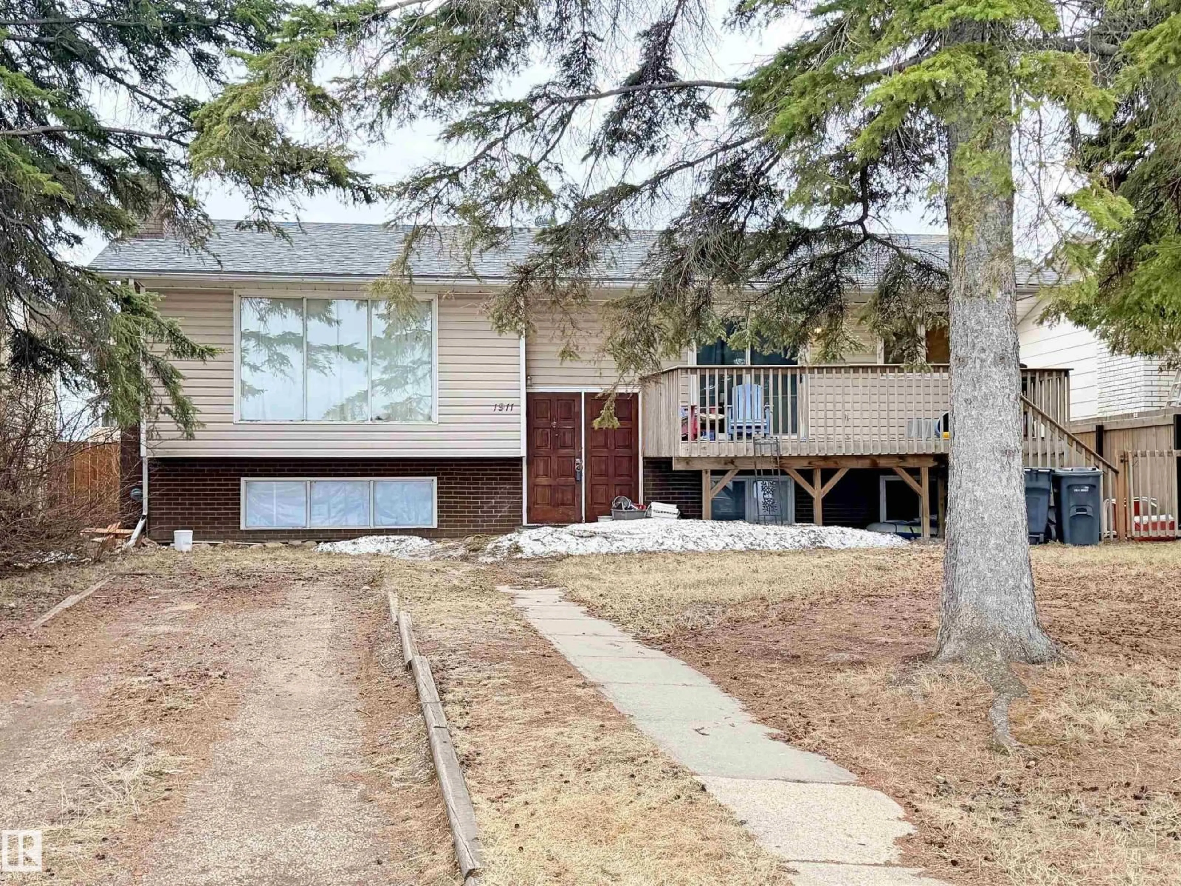 Home with vinyl exterior material, street for 1911 1 AV, Cold Lake Alberta T9M1E4