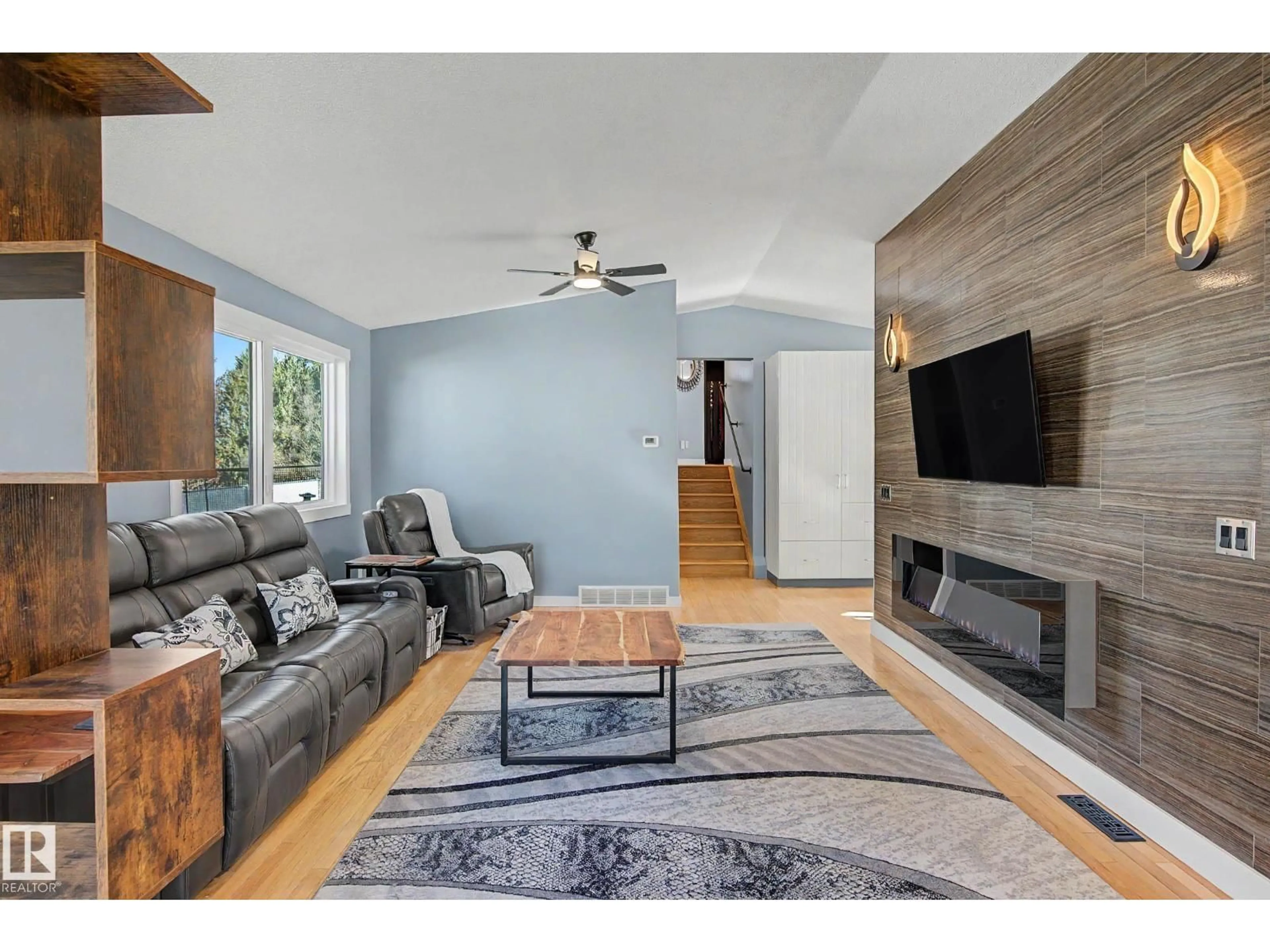 Living room with furniture, wood/laminate floor for 4109 44 AV, Stony Plain Alberta T7Z1K3