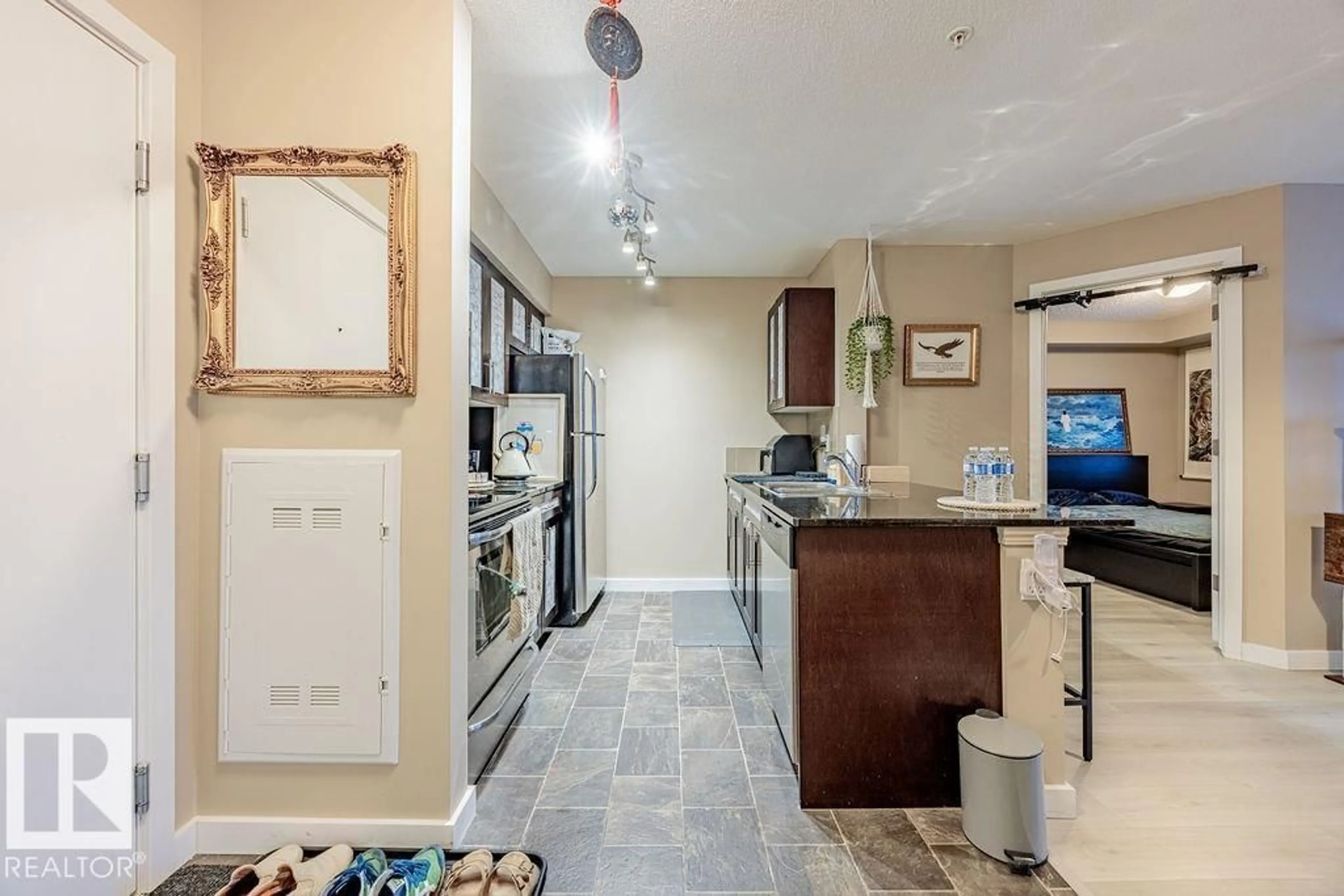 Open concept kitchen, ceramic/tile floor for 310 - 12025 22 AV, Edmonton Alberta T6W2Y1