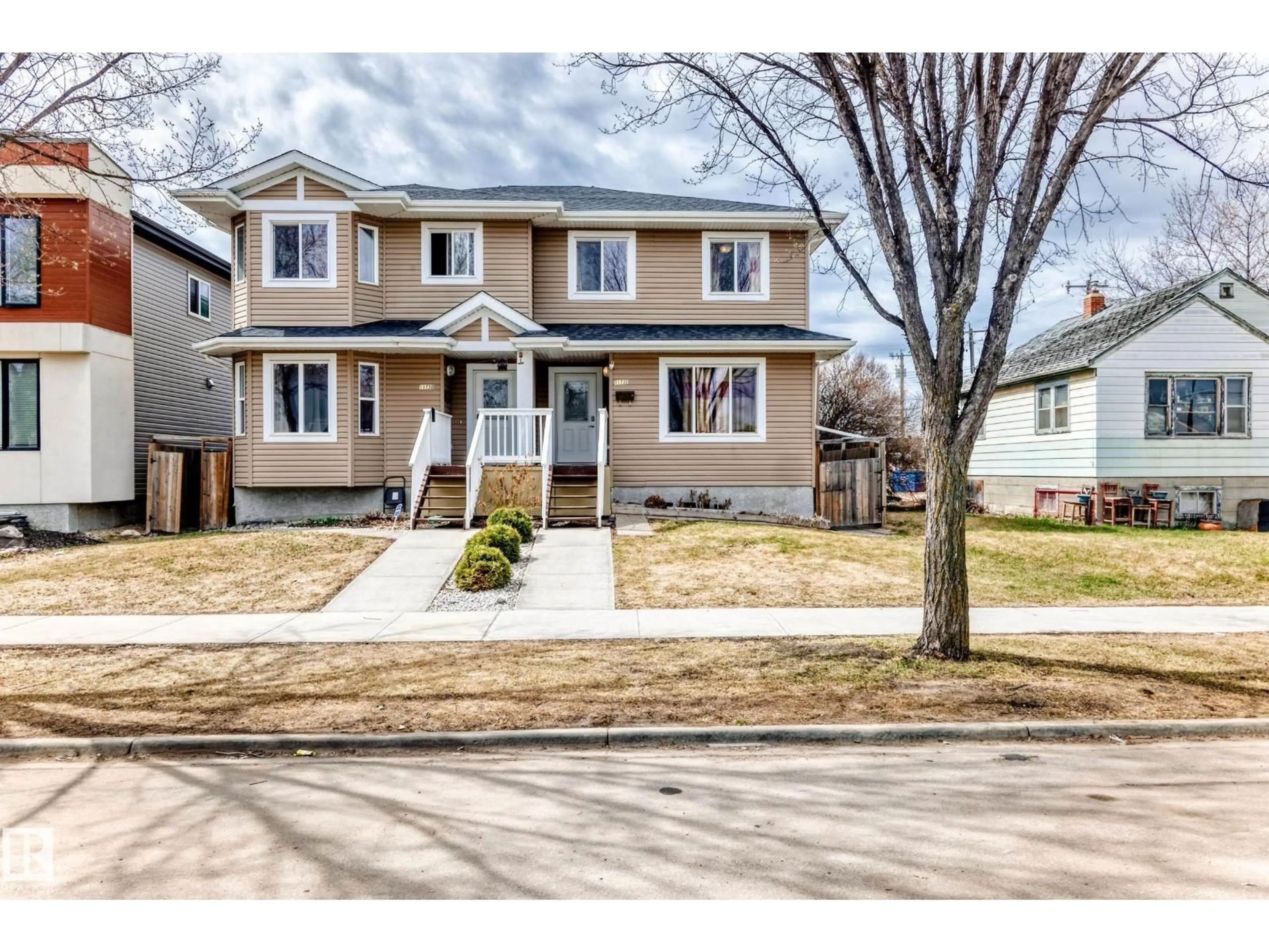 Home with vinyl exterior material, street for NW - 11732 123 ST, Edmonton Alberta T5M0G9