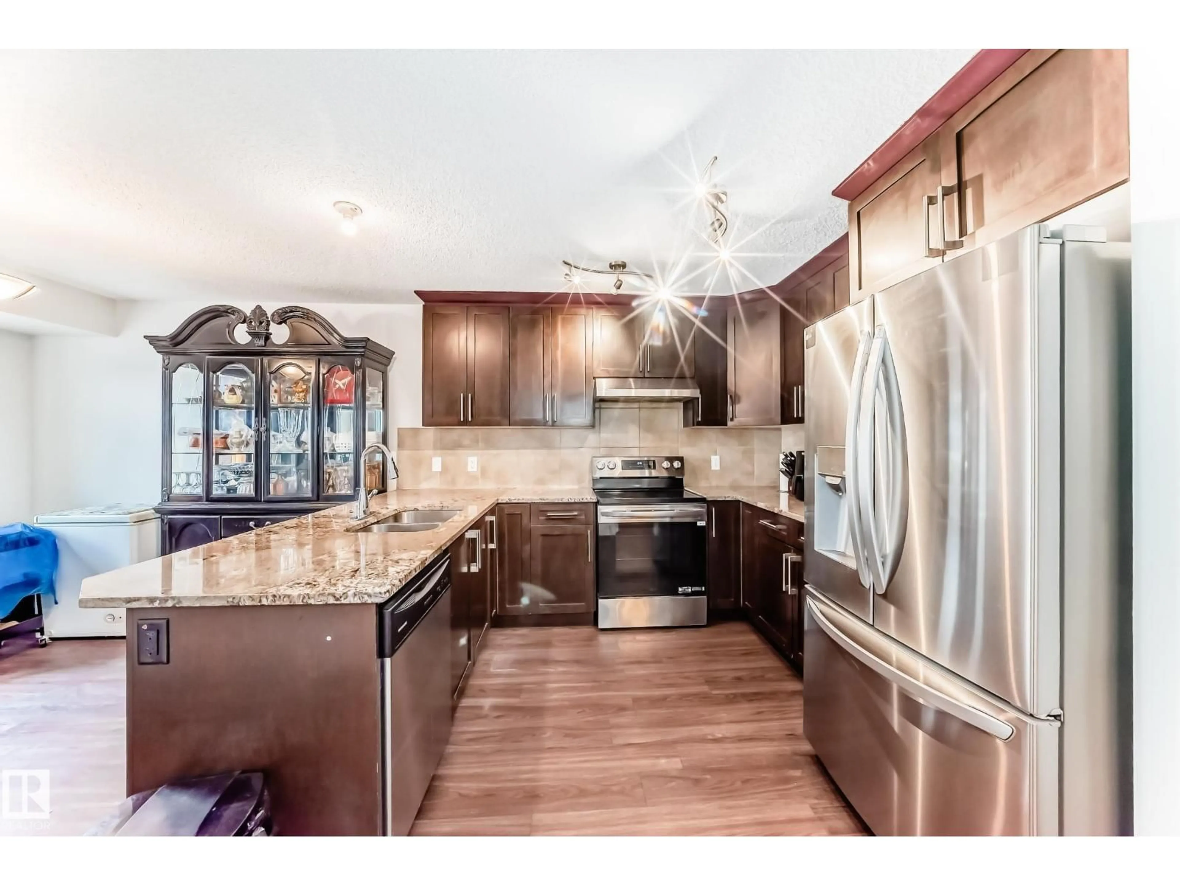 Open concept kitchen, unknown for NW - 11732 123 ST, Edmonton Alberta T5M0G9
