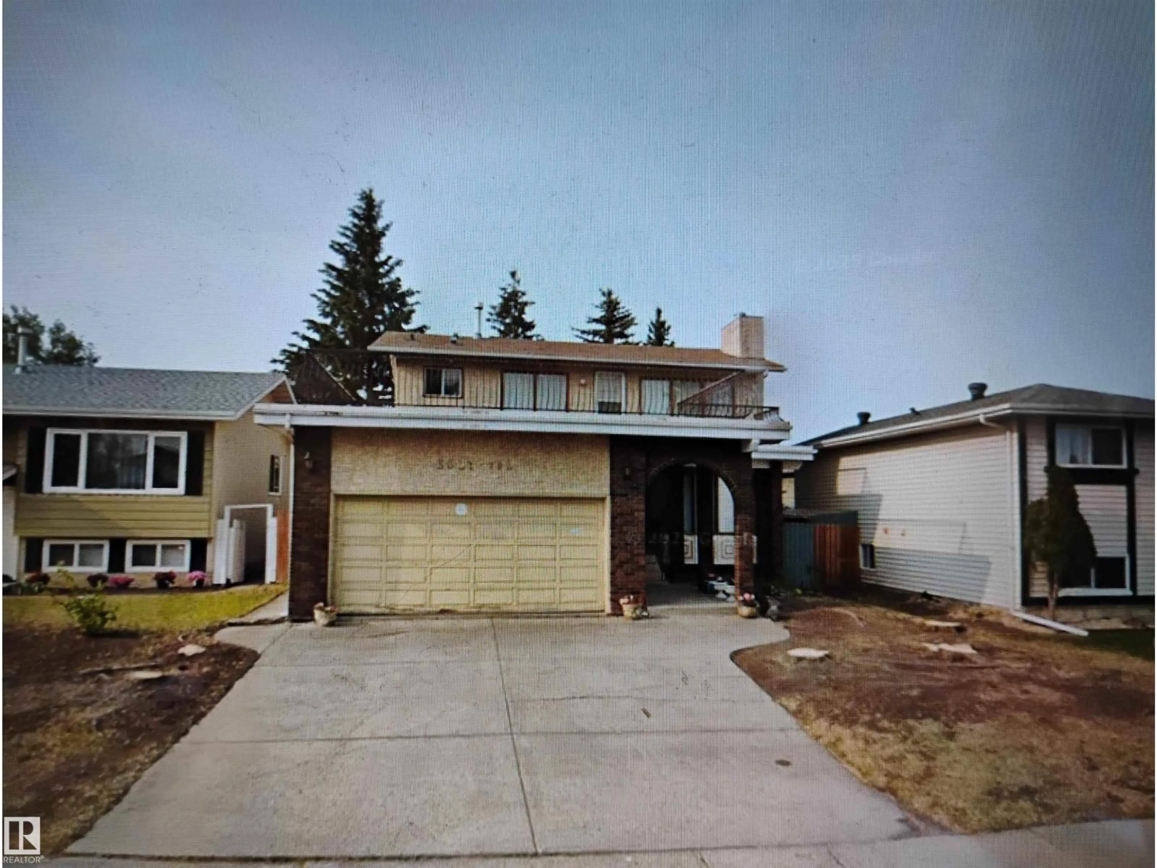 Home with vinyl exterior material, street for 3031 79 ST, Edmonton Alberta T6K3N2