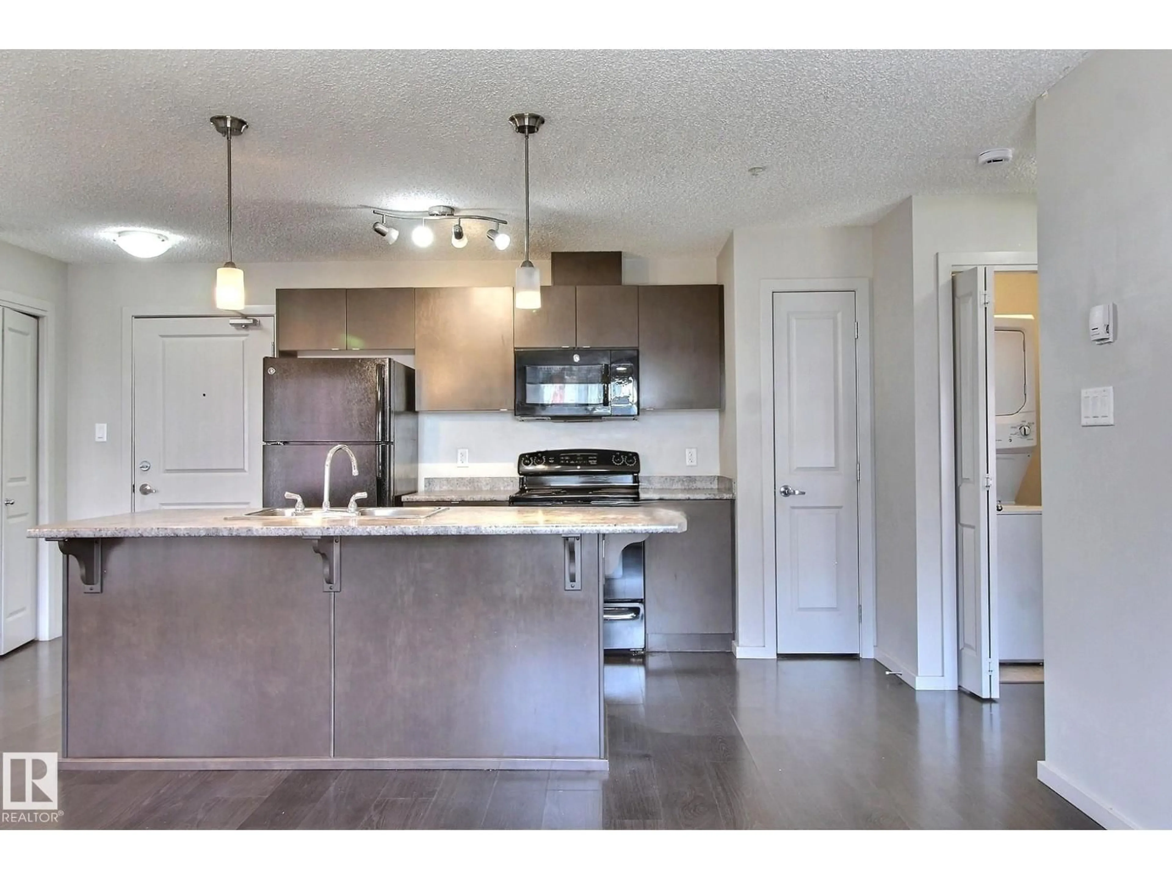 Open concept kitchen, unknown for 344 - 324 WINDERMERE RD, Edmonton Alberta T6T0P3