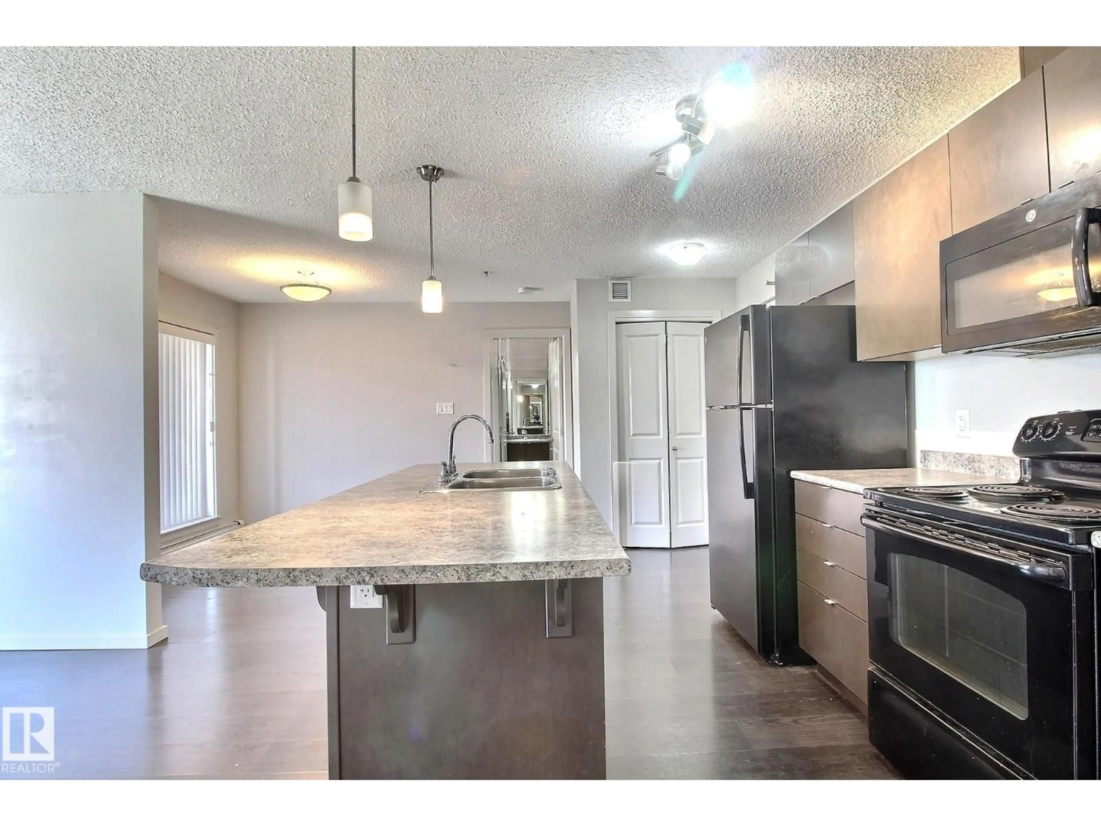 Open concept kitchen, unknown for 344 - 324 WINDERMERE RD, Edmonton Alberta T6T0P3
