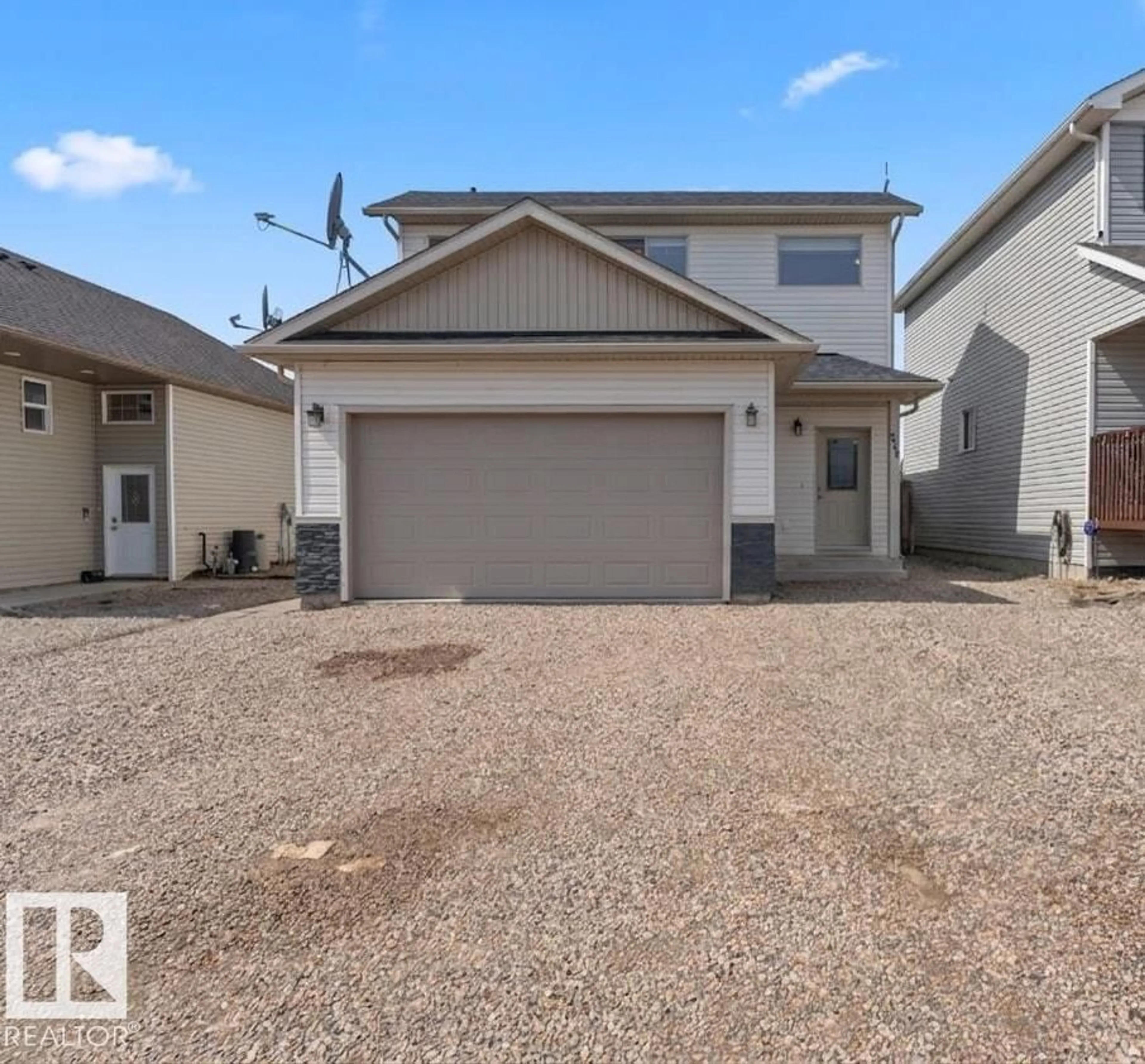 Home with vinyl exterior material, street for 206 26 ST, Cold Lake Alberta T9M0E3