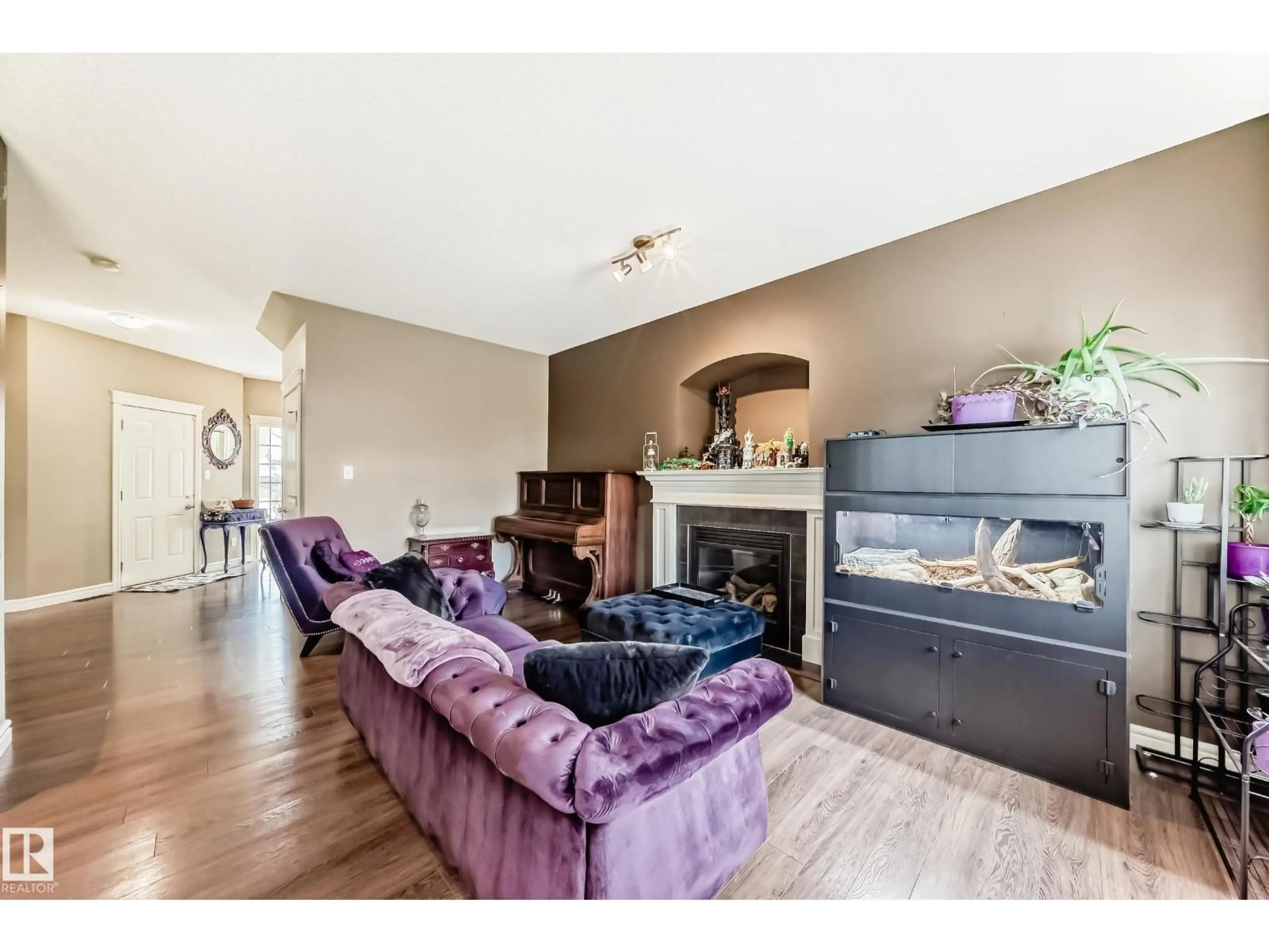 Living room with furniture, wood/laminate floor for 26 SOUTH CREEK WD, Stony Plain Alberta T7Z0C8