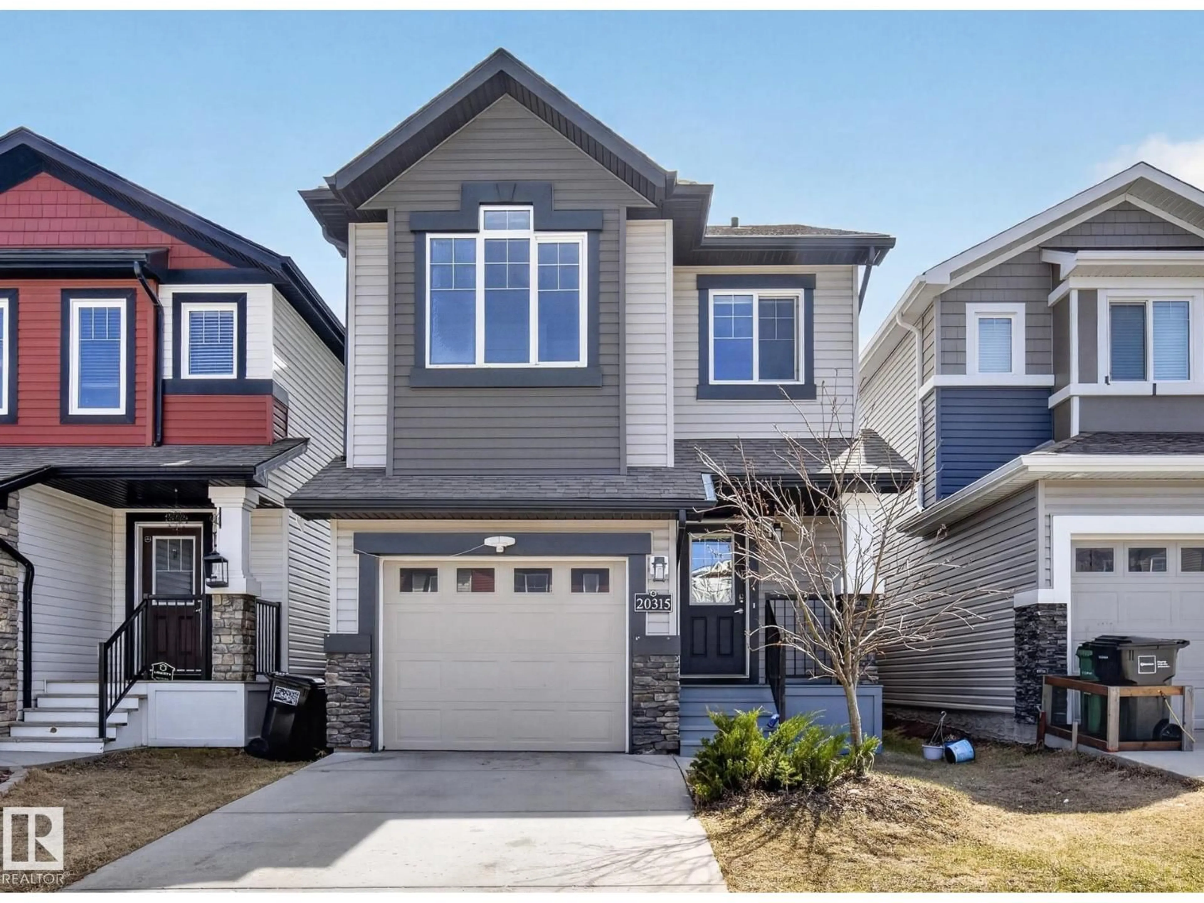 Home with vinyl exterior material, street for 20315 43 AV, Edmonton Alberta T6M0R8