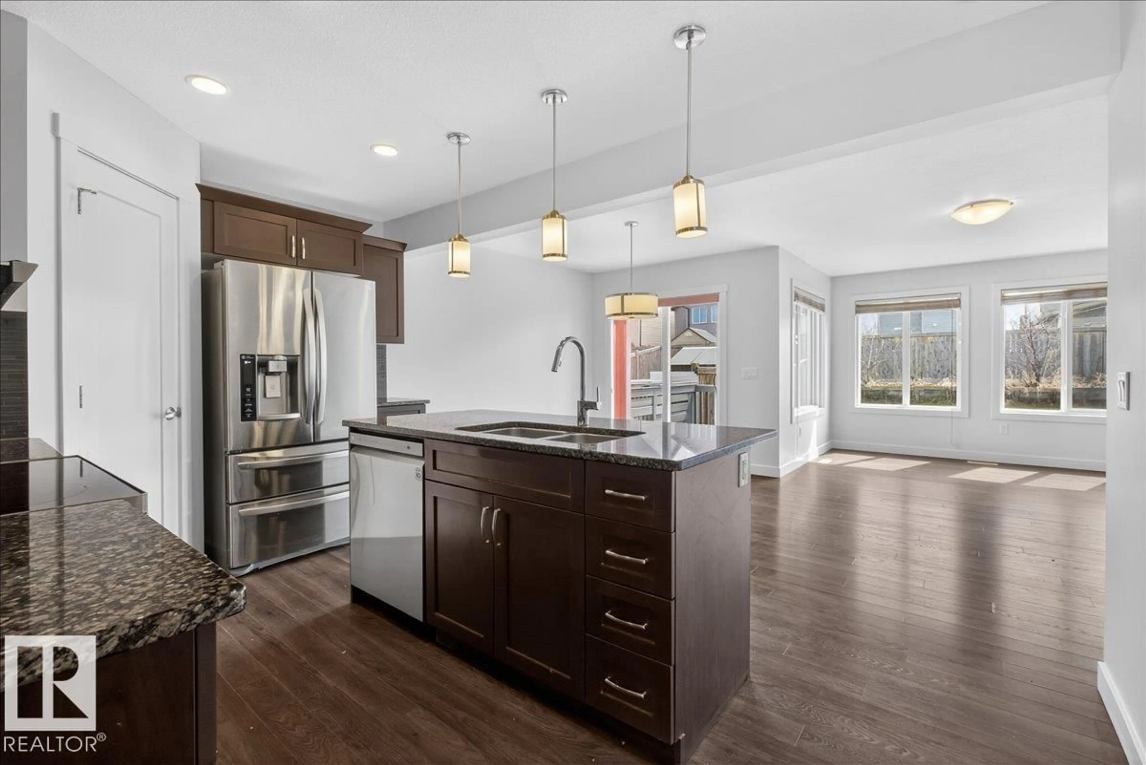 Open concept kitchen, unknown for 20315 43 AV, Edmonton Alberta T6M0R8