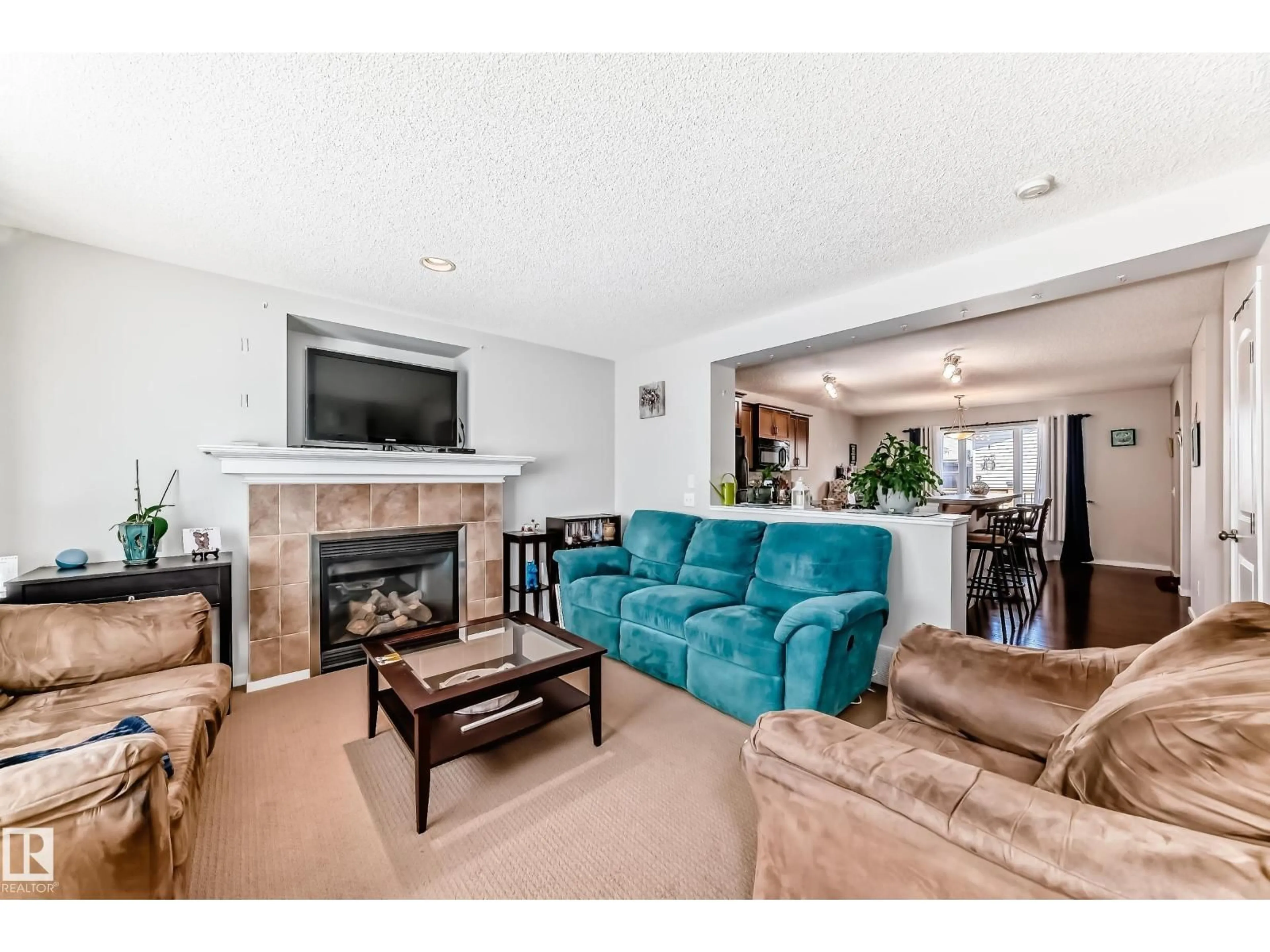 Living room with furniture, unknown for SW - 115 60 ST, Edmonton Alberta T6X0E7