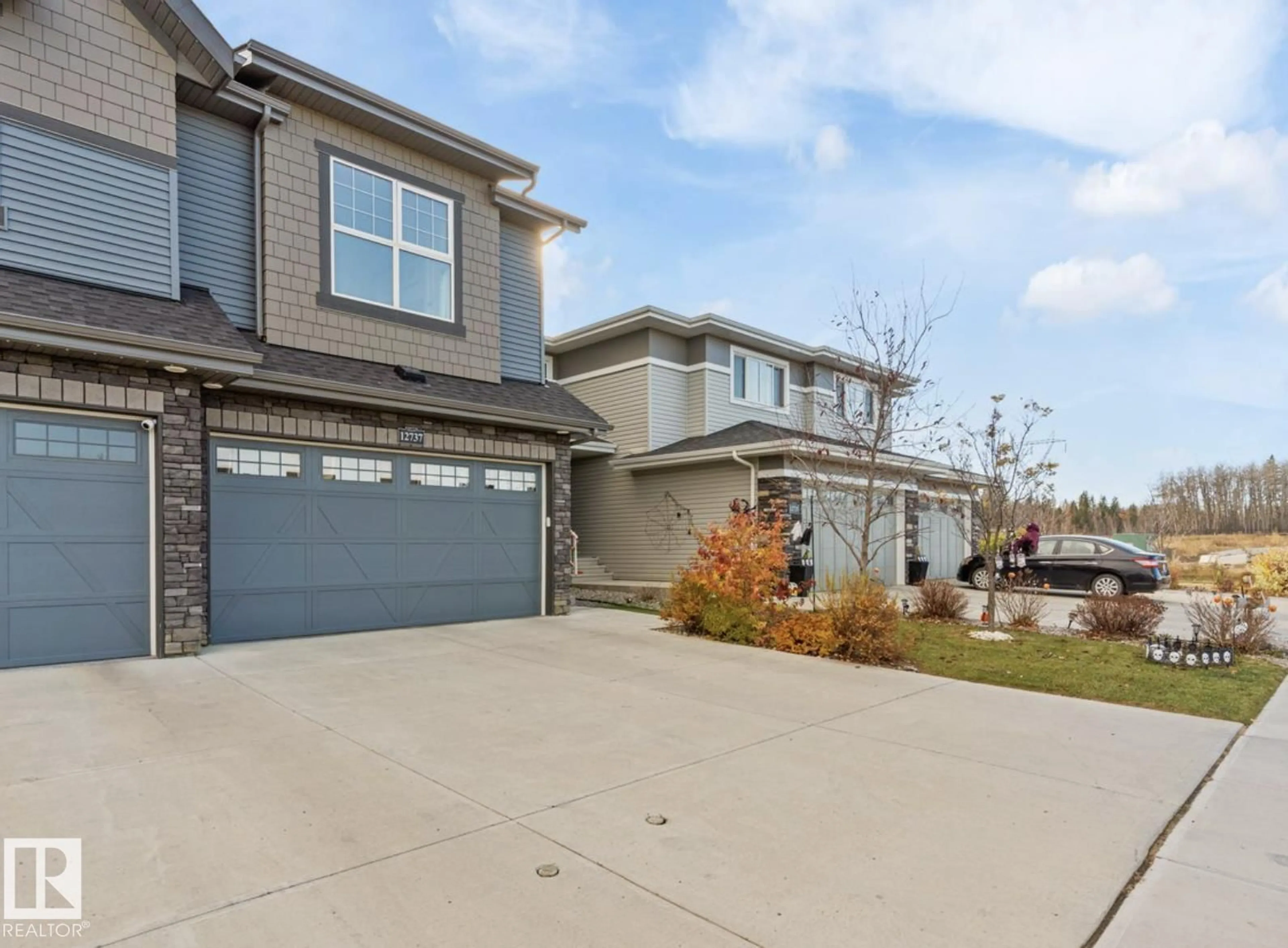 Home with vinyl exterior material, street for 12737 205 STREET, Edmonton Alberta T5S0L8