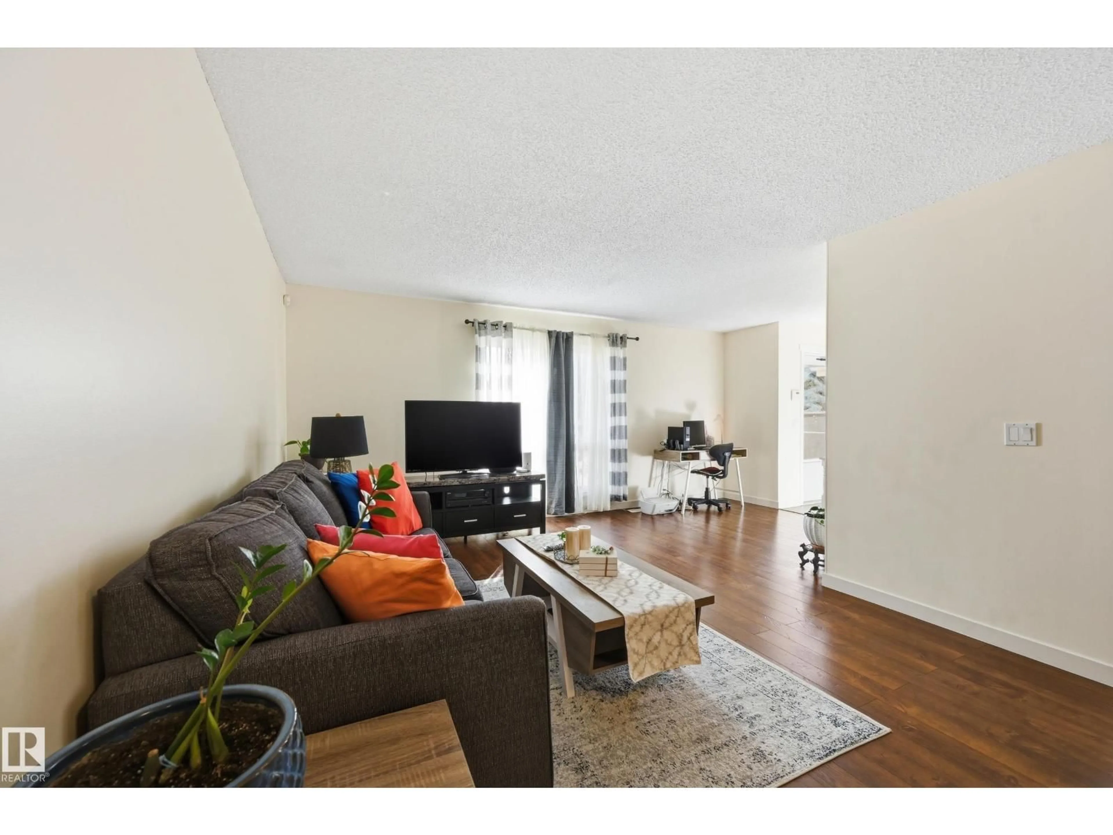 Living room with furniture, wood/laminate floor for 18424 96A AV, Edmonton Alberta T5T3N9