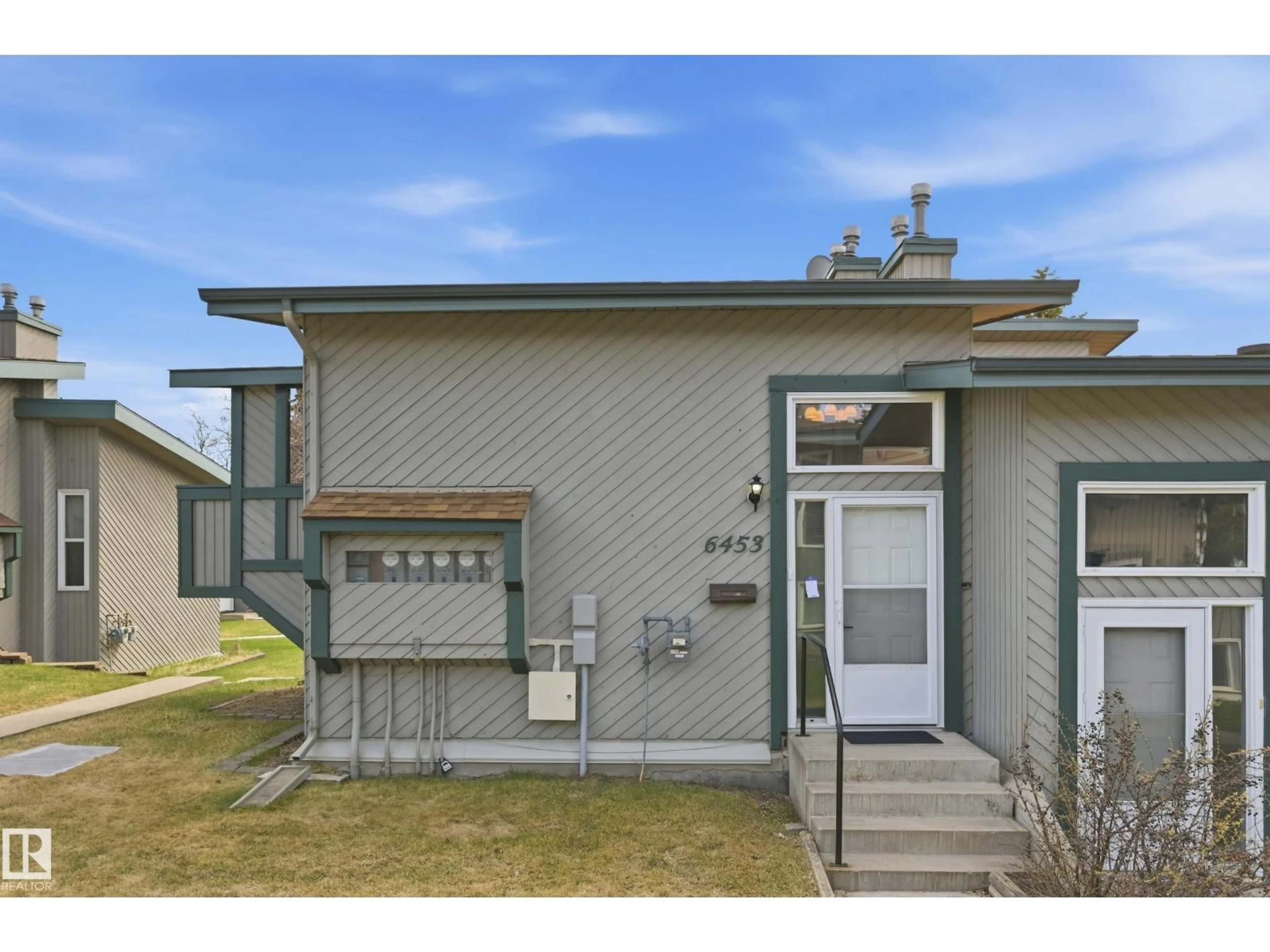 Home with vinyl exterior material, unknown for 6453 180 ST, Edmonton Alberta T5T2P3
