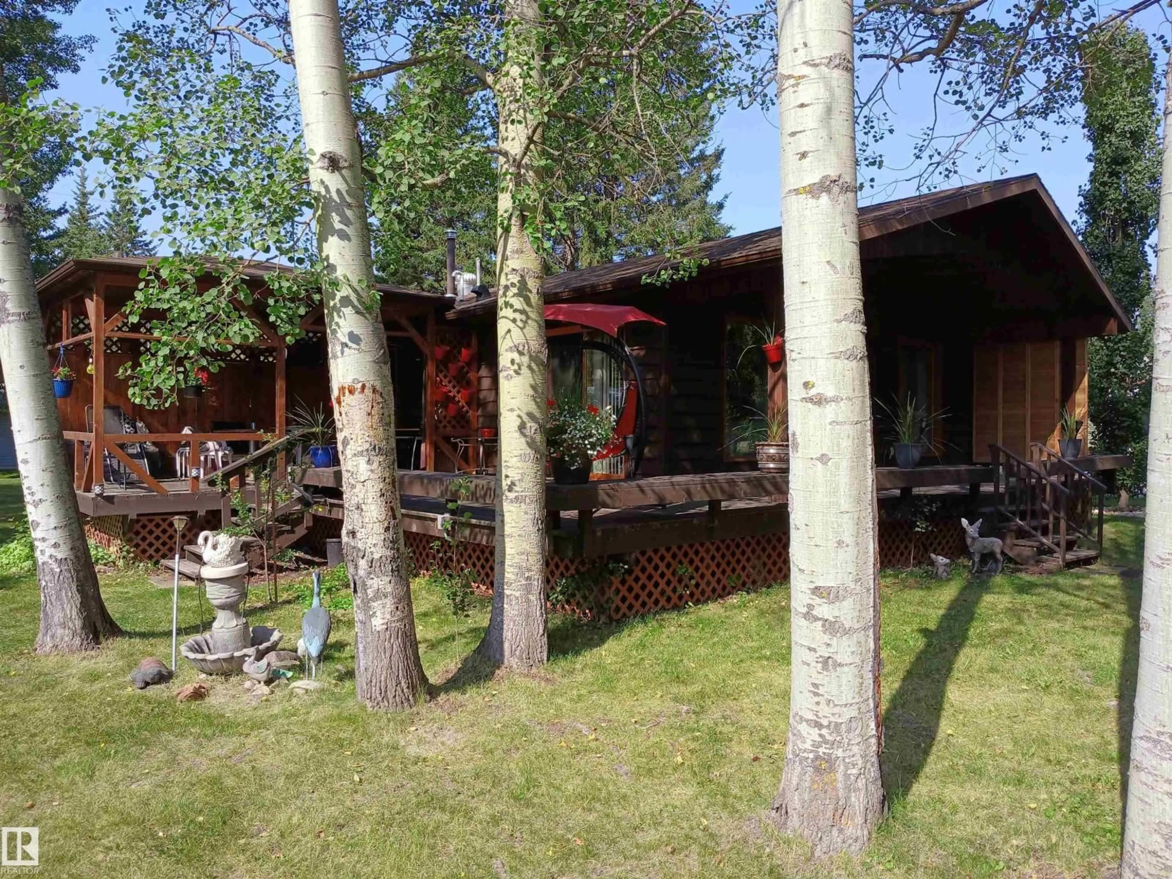 Patio, forest/trees view for 6309 49 ST, Rural Wetaskiwin County Alberta T0C2C0