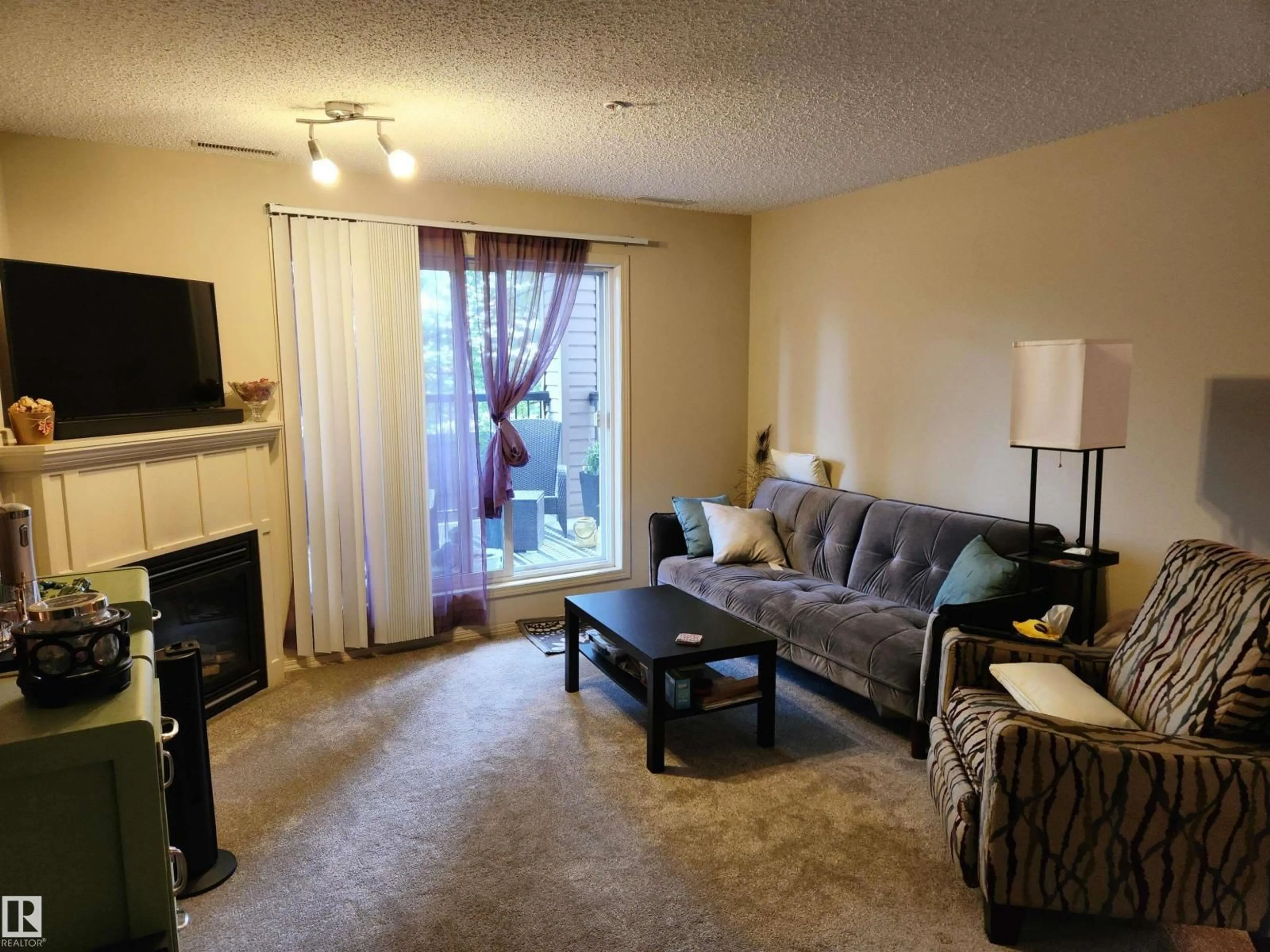 Living room with furniture, unknown for #123 - 2098 BLACKMUD CREEK DR, Edmonton Alberta T6W1T7