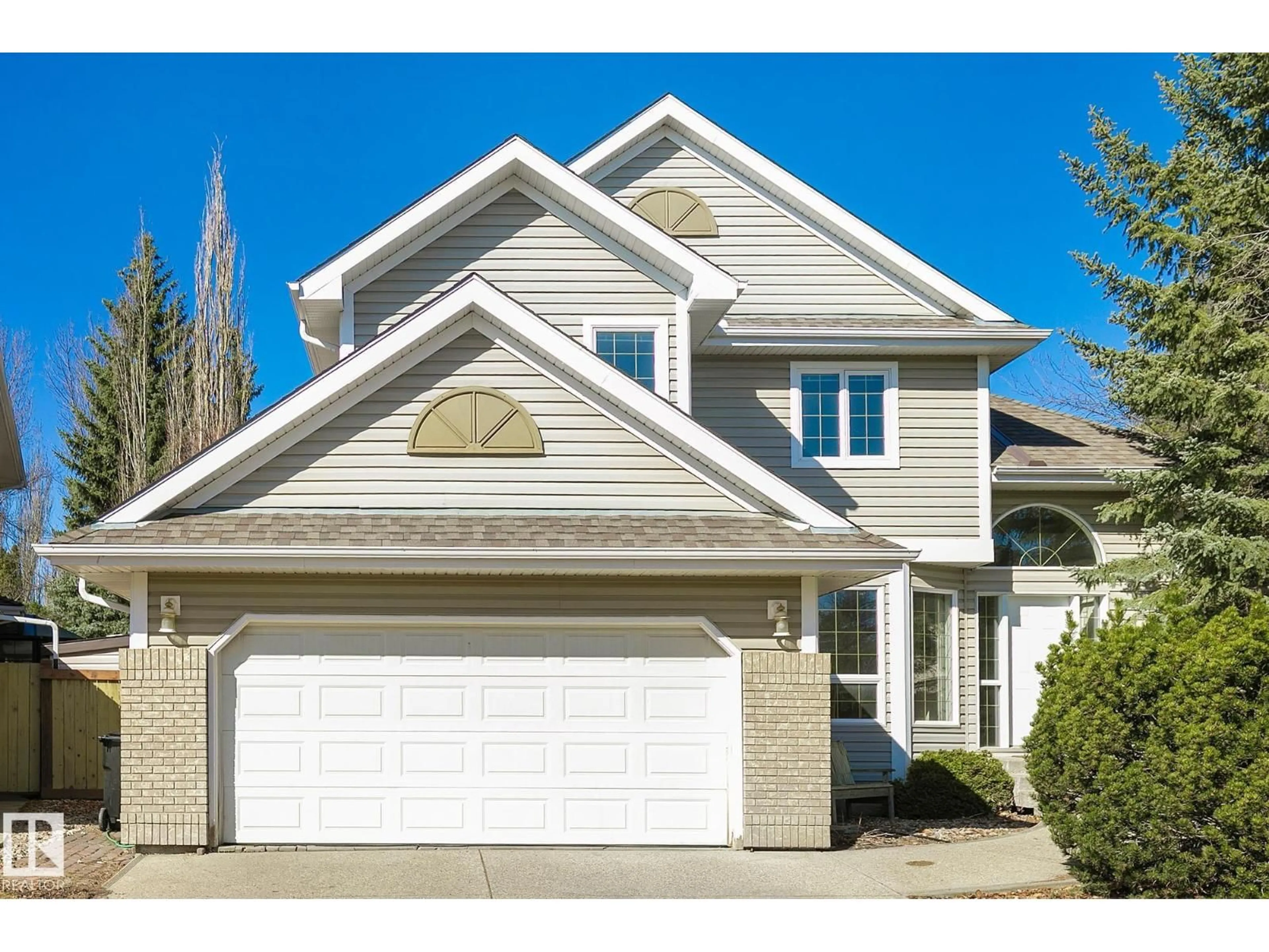Home with vinyl exterior material, street for 721 BUTTERWORTH DR, Edmonton Alberta T6R2M7