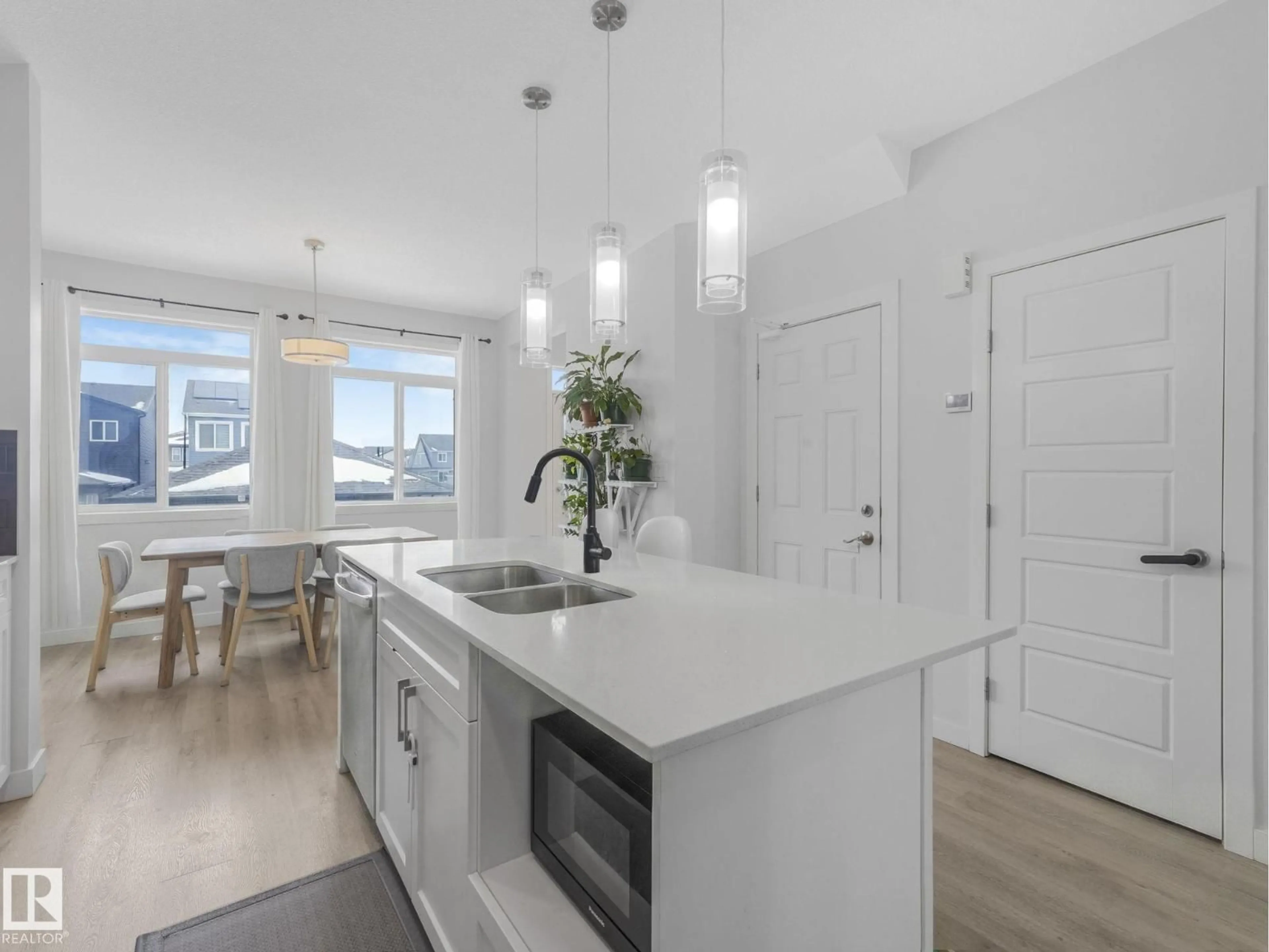 Open concept kitchen, unknown for 1404 PODERSKY LI, Edmonton Alberta T6W4W4
