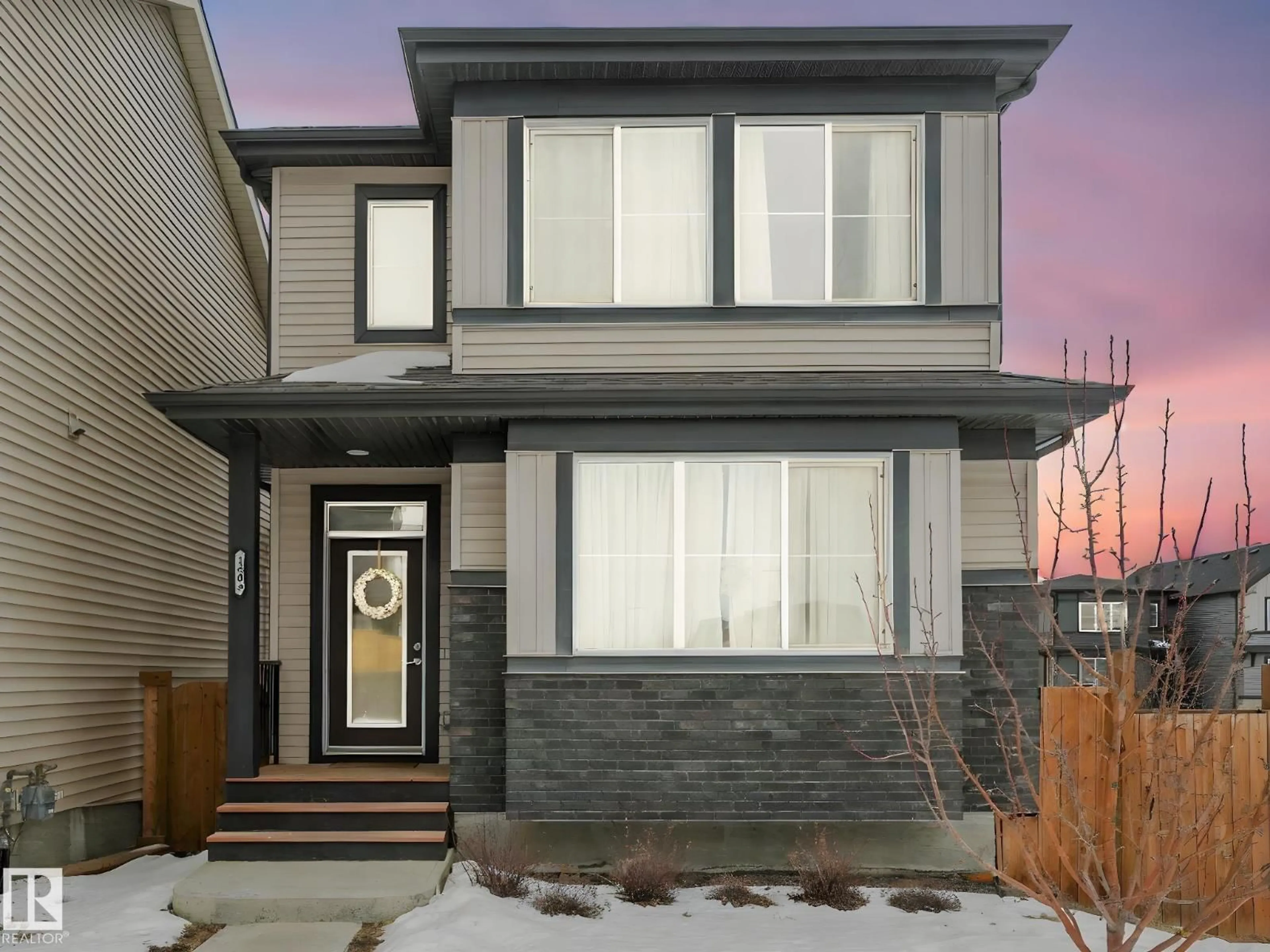 Home with vinyl exterior material, street for 1404 PODERSKY LI, Edmonton Alberta T6W4W4
