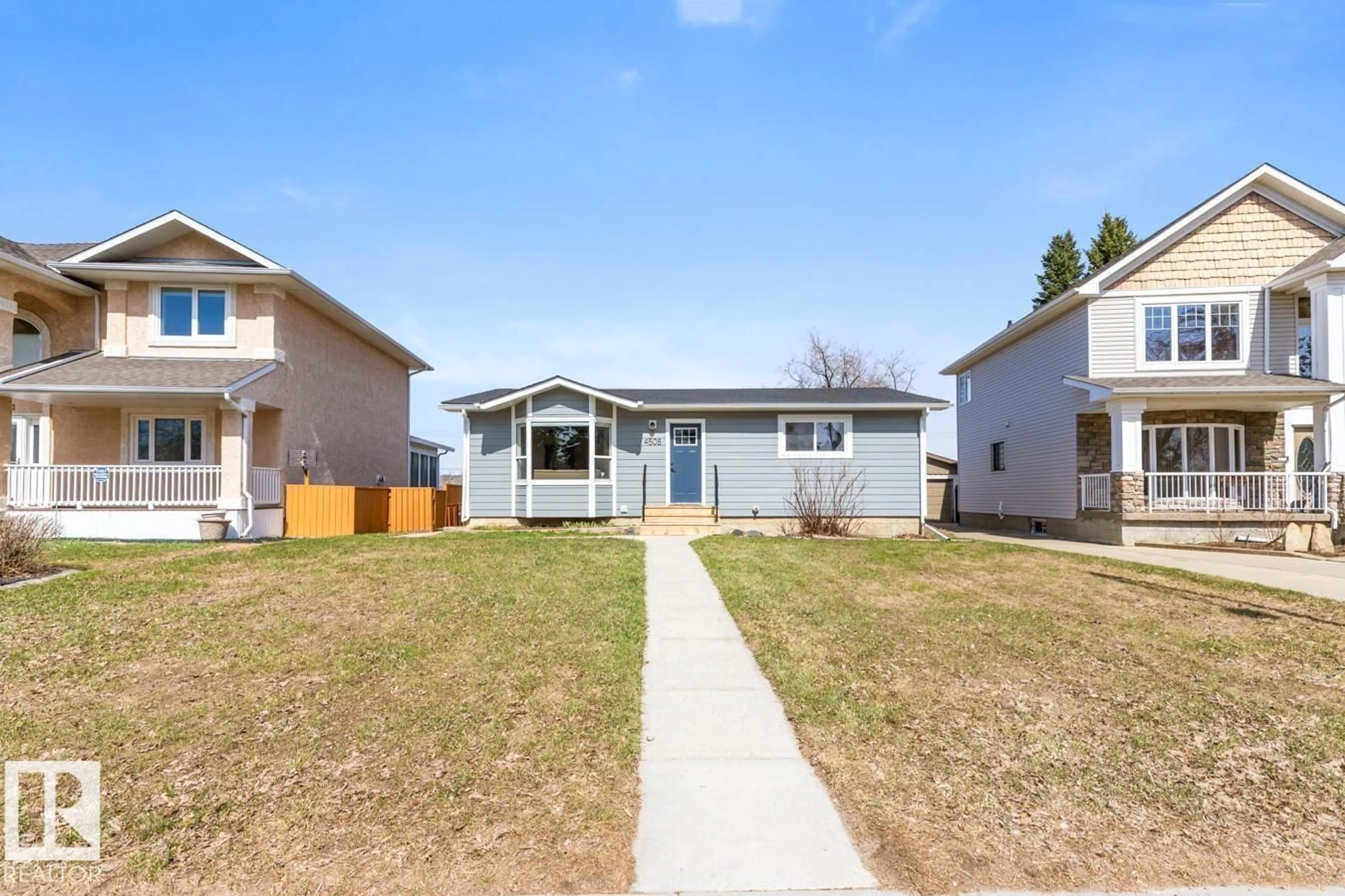 Home with vinyl exterior material, street for 4508 109A AV, Edmonton Alberta T6A1S4