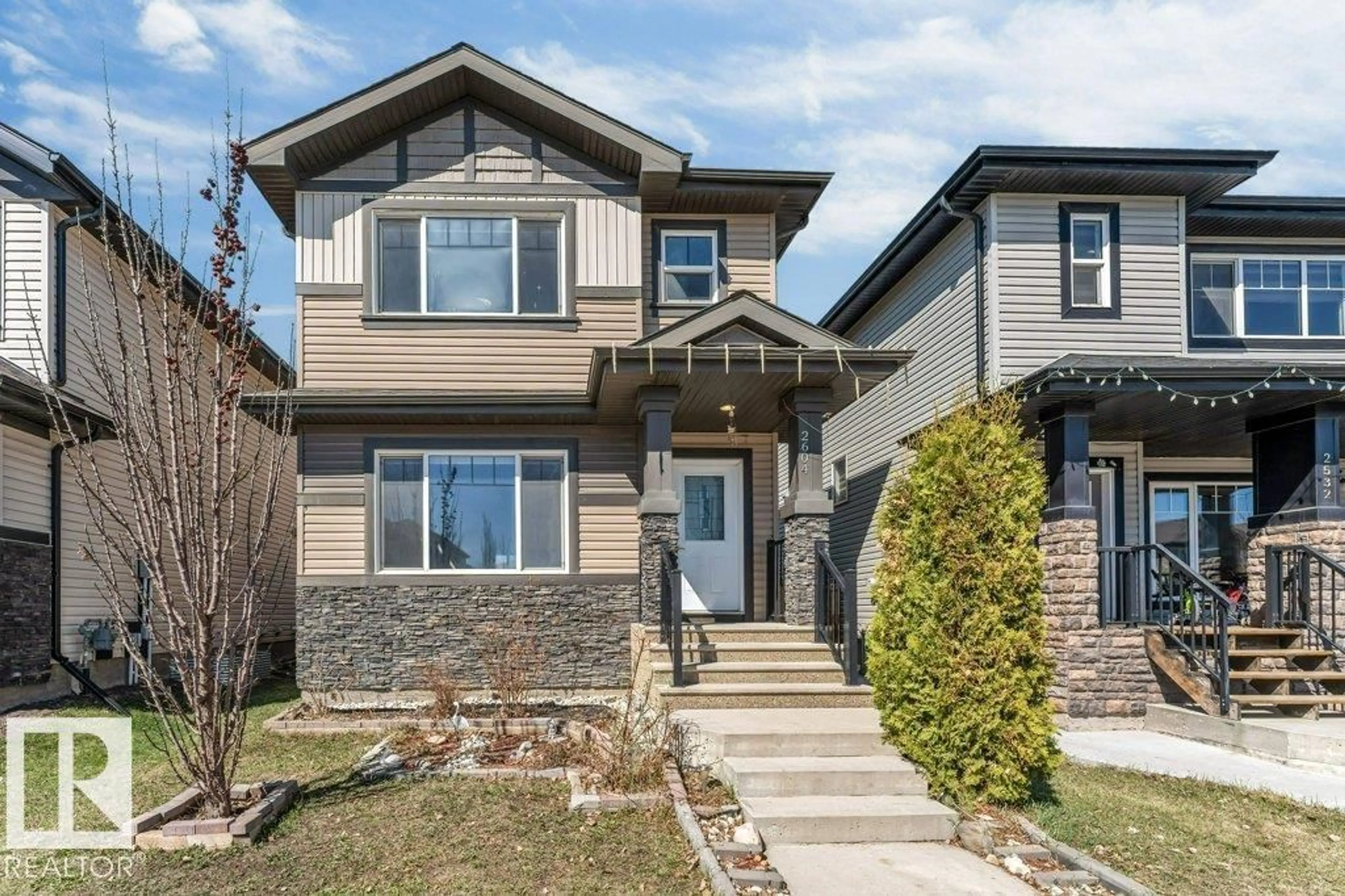 Home with brick exterior material, street for 2604 20 AV, Edmonton Alberta T6T0Y7