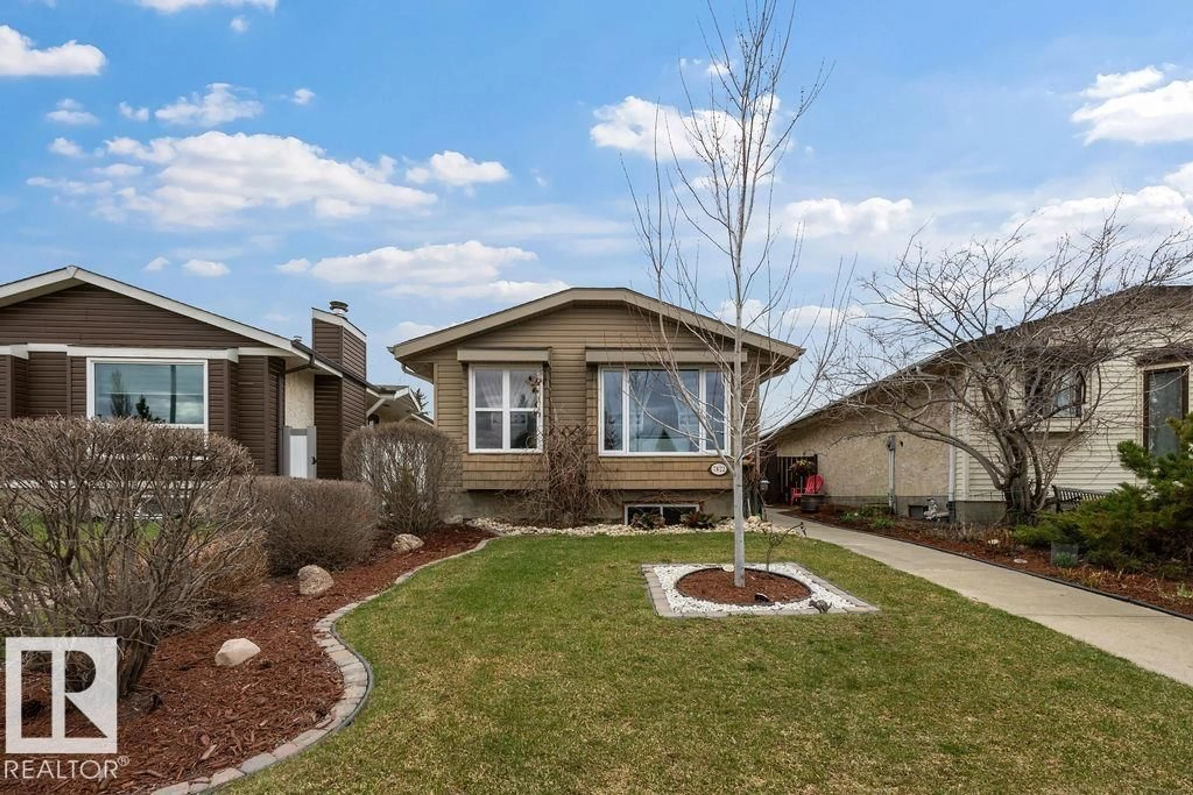 Home with vinyl exterior material, street for NW - 7422 188 ST, Edmonton Alberta T5T5J7