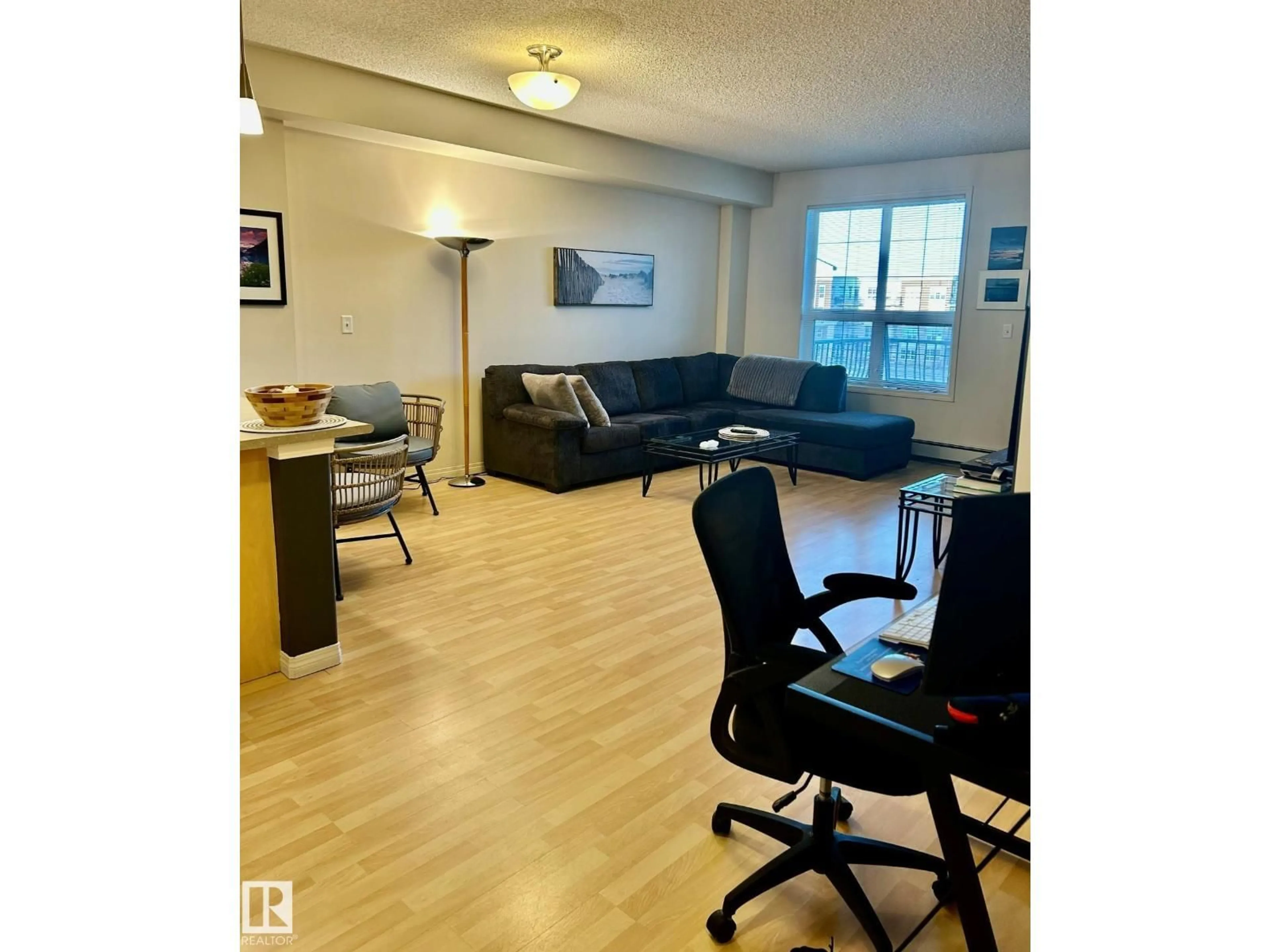 Living room with furniture, wood/laminate floor for 322 12310 102 ST, Grande Prairie Alberta T8V0N4