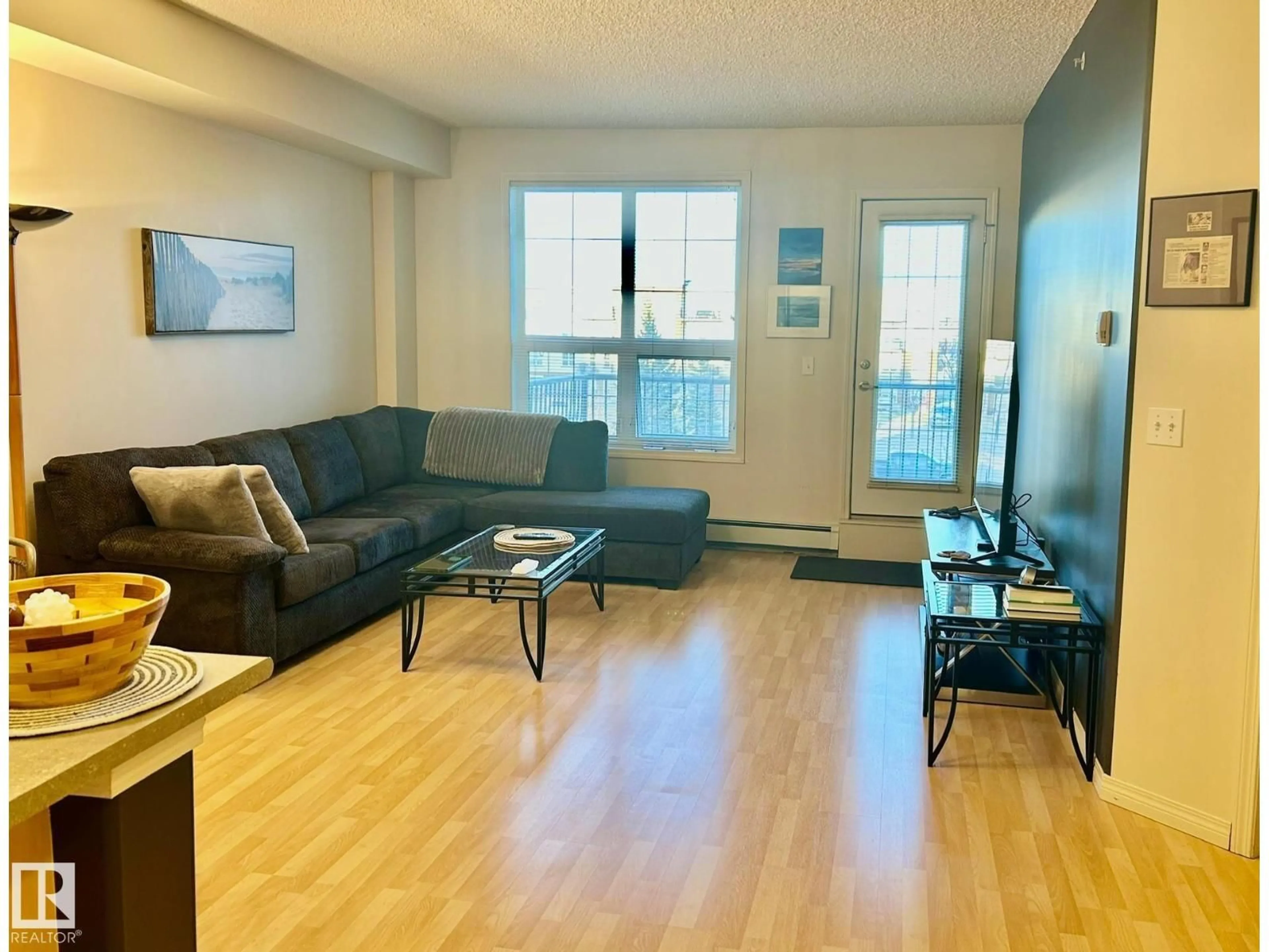 Living room with furniture, wood/laminate floor for 322 12310 102 ST, Grande Prairie Alberta T8V0N4
