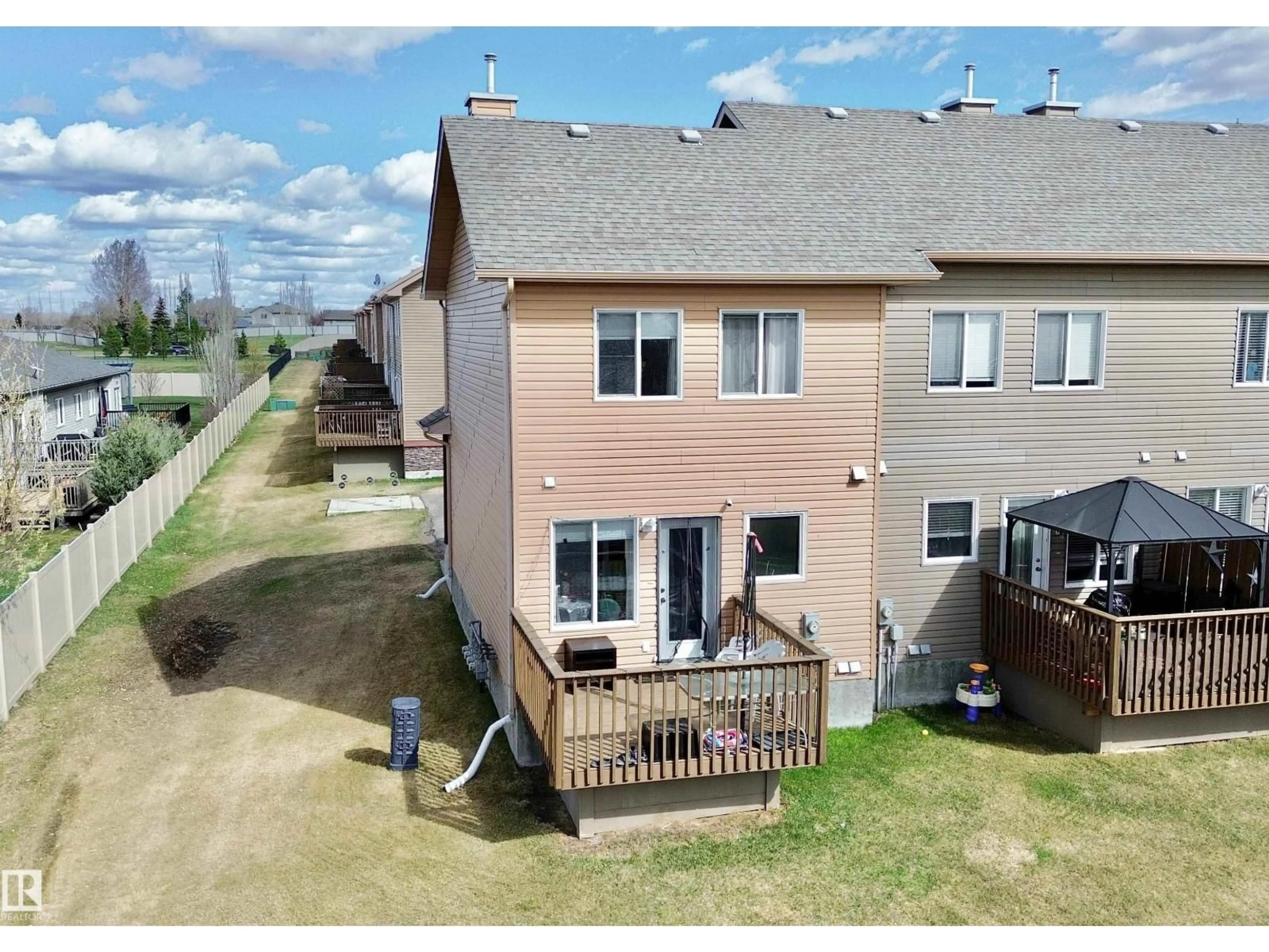 A pic from outside/outdoor area/front of a property/back of a property/a pic from drone, unknown for #4 - 320 SPRUCE RIDGE RD, Spruce Grove Alberta T7X0H5