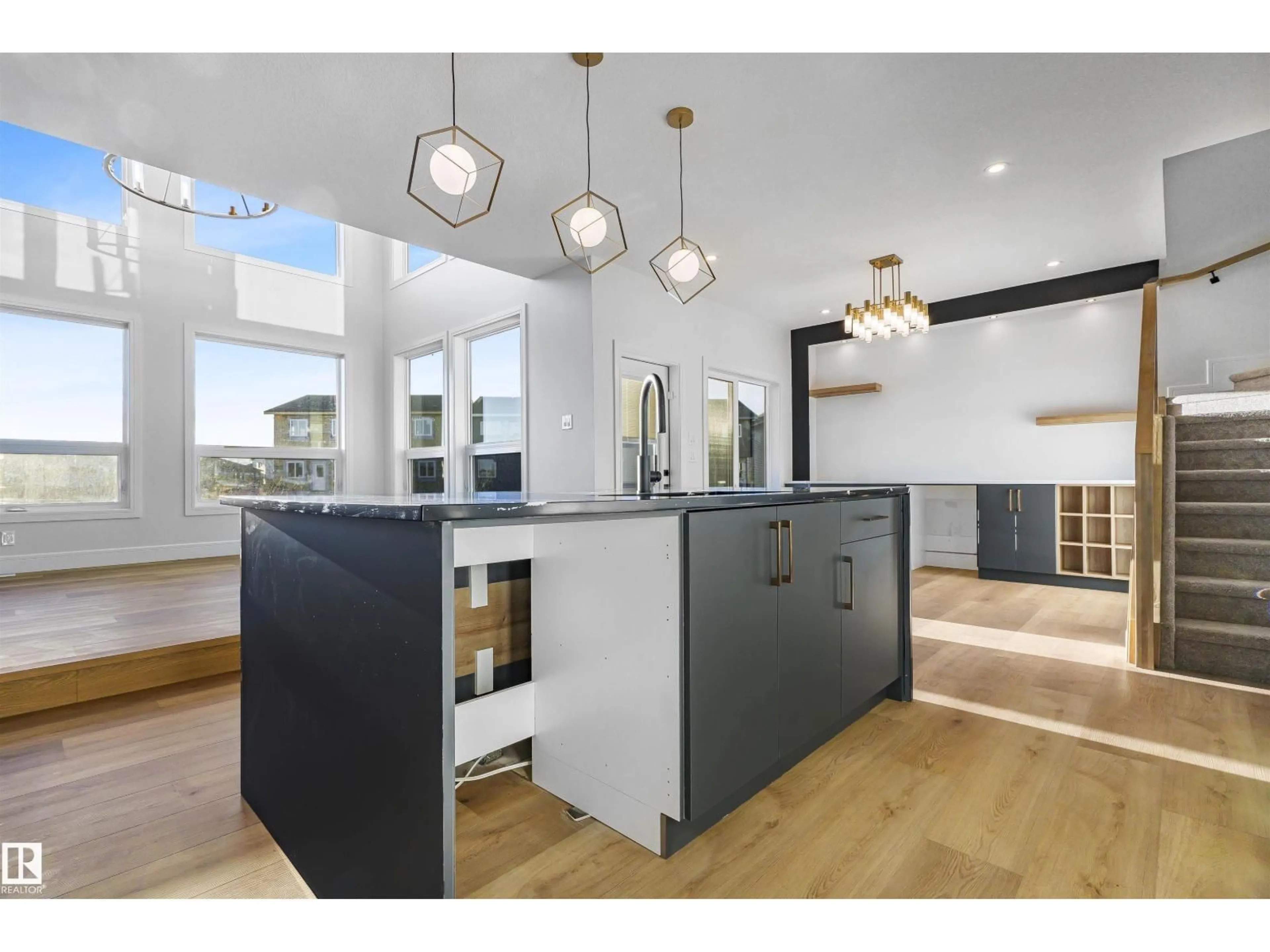 Open concept kitchen, wood/laminate floor for 372 CREEKSIDE GREEN, Leduc Alberta T9E1W5