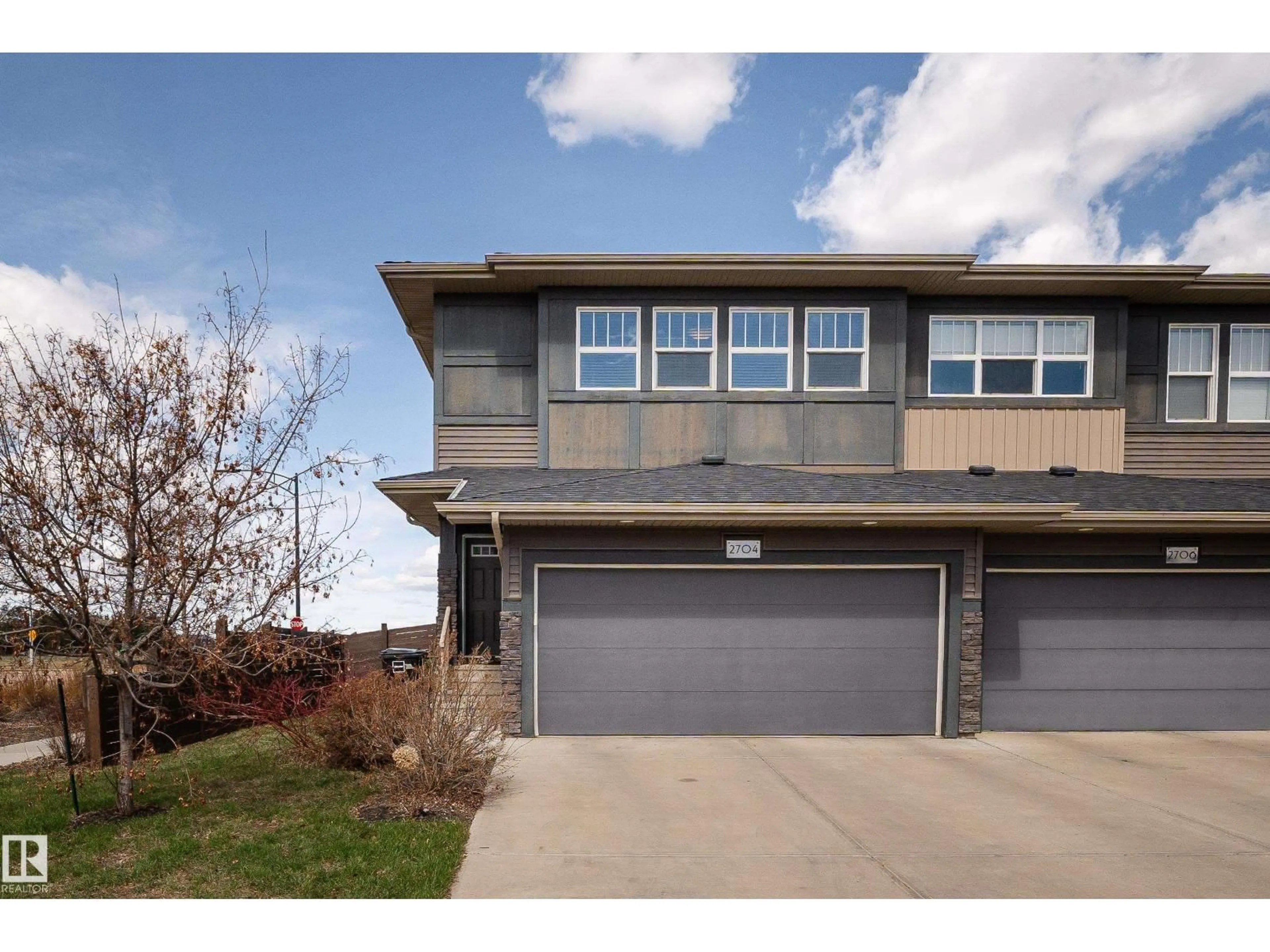 Home with vinyl exterior material, street for 2704 KOSHAL PL, Edmonton Alberta T6W3J7